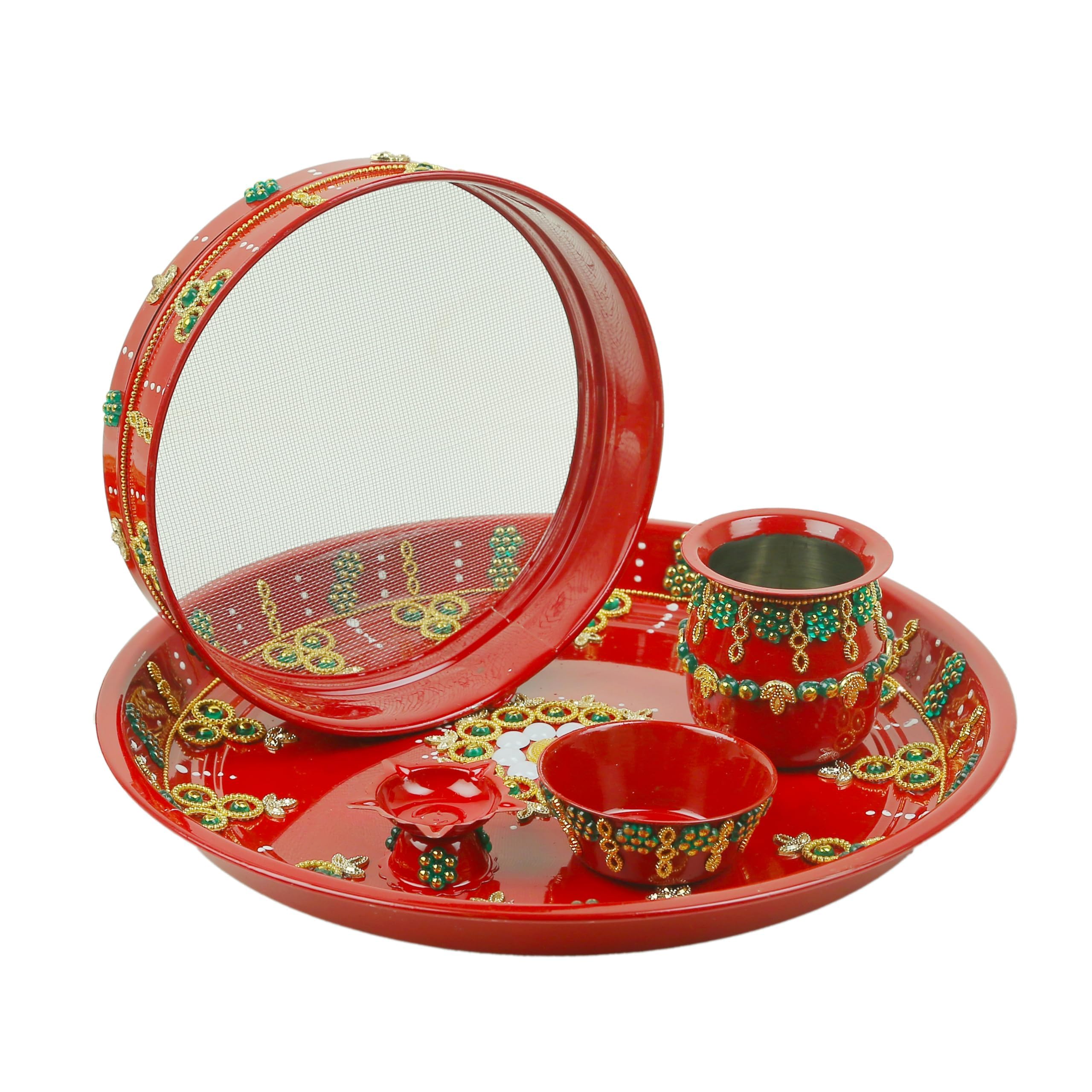 Conjunto decorativo tradicional indio con plato de acero y artículos de altar