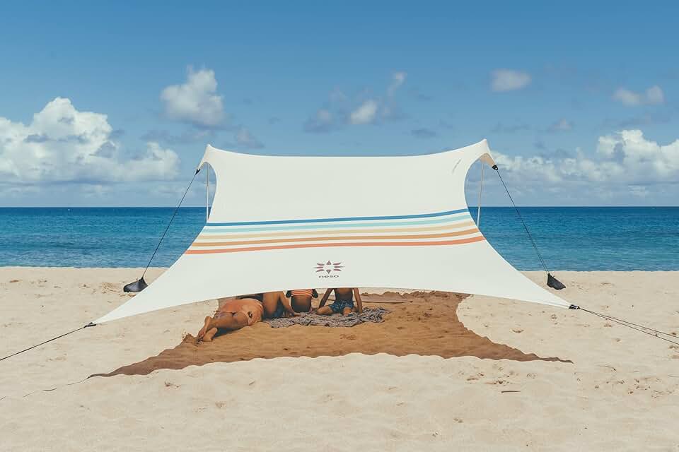 Neso Portable Beach Tent Sun Shelter - Lightweight Beach Shade Canopy - Easy Setup for Family Outings - Patented Reinforced Corner