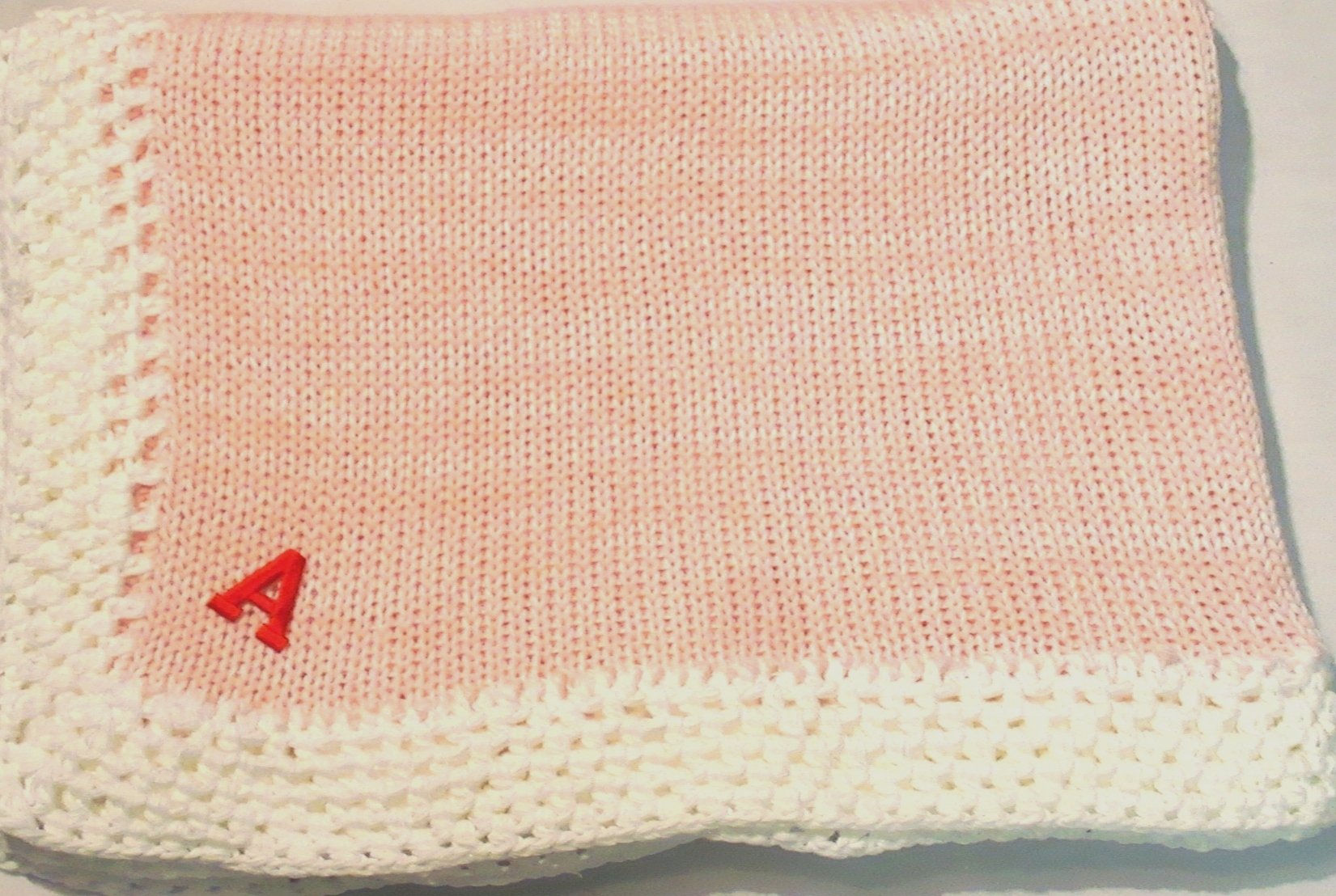 Hand Machine Knitted Finished with Hand Crochet Pink and White Tweed Cotton Infant Girls Forty Five Inch Long Thirty Two Wide Blanket Hand Crochet Trimmed with White Cotton and Red “A” Monogram