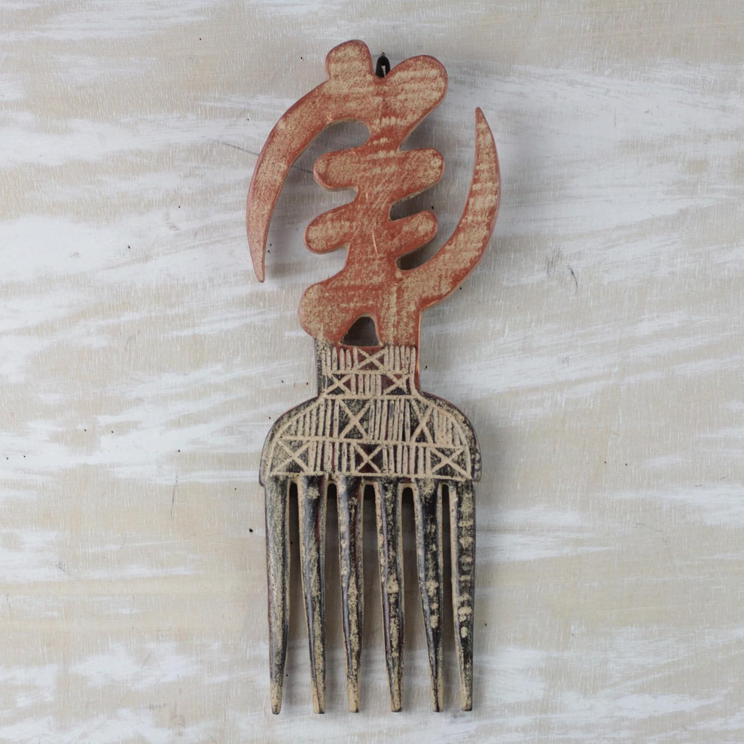 NOVICA Artisan Handmade Wood Decorative Comb Adinkre Wall from Ghana Brown Red Accessories Home Accents Cultural Rustic [14.5in H x 5.5in W x 0.8in D] 'Gye Nyame Style'