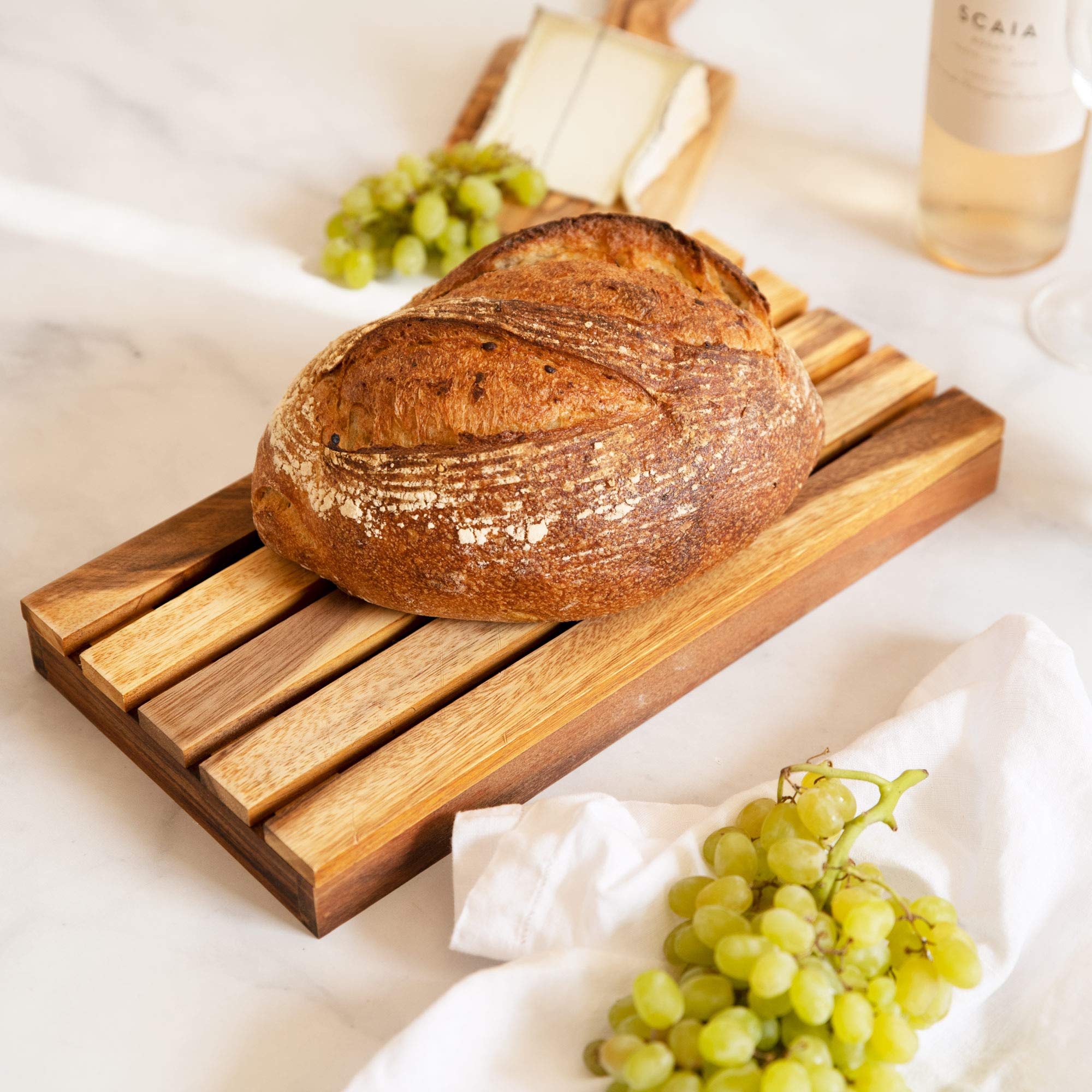 Villa Acacia Wood Bread Board - 12 x 7 in Handcrafted Wooden Cutting Board Slicer Tray with Handle