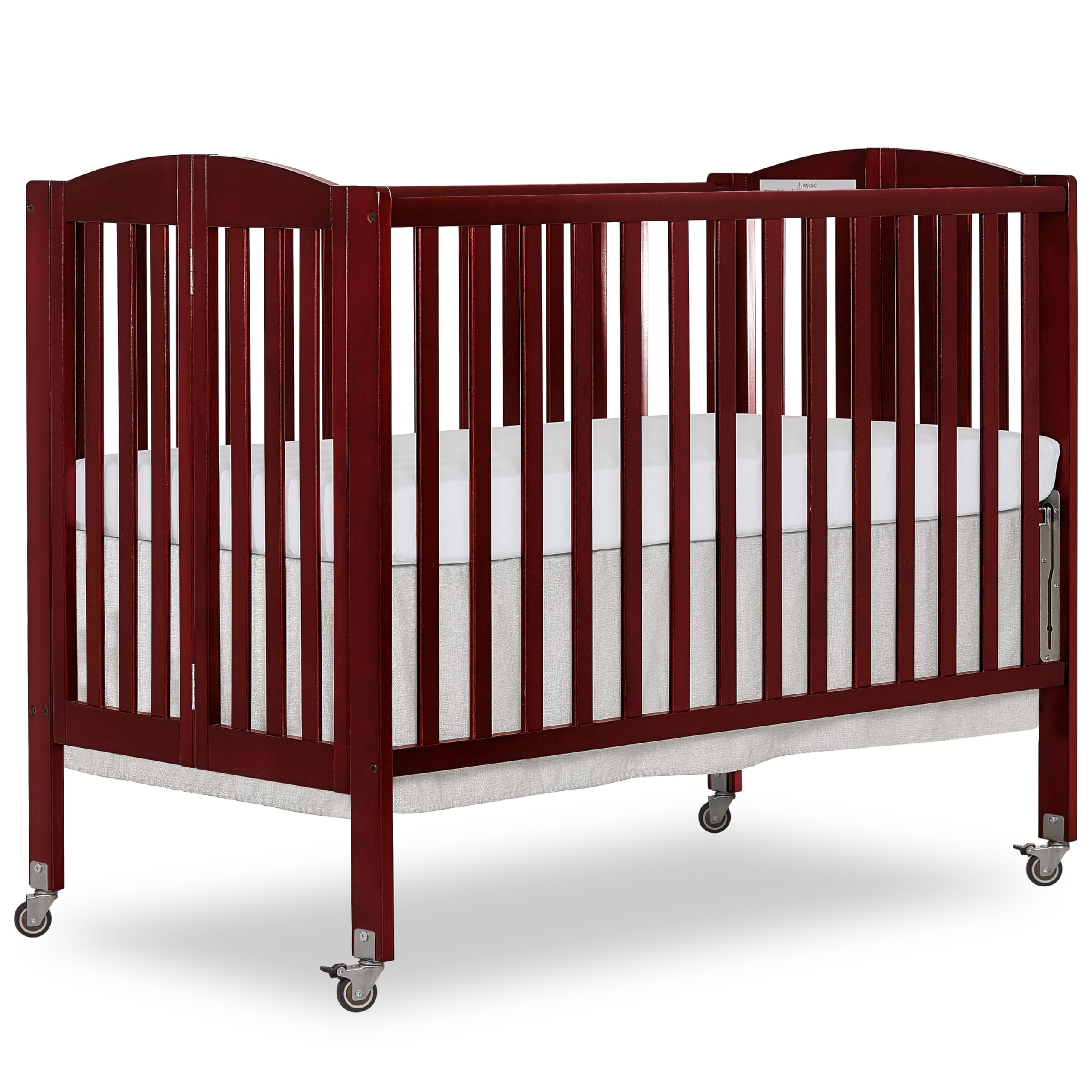 Photo 1 of Dream On Me Full-Size 2-in-1 Folding Baby Crib in Cherry GreenGuard Gold & JPMA, Portable, Patented Quick Folding System, Strong Wheels, 2 Adjustable Mattress Heights