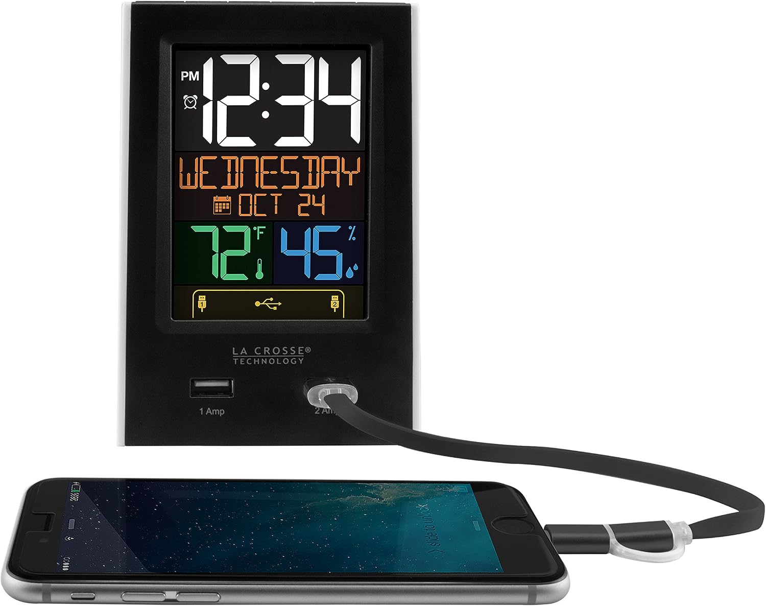 La Crosse Technology C86224 alarm clock charging a smartphone via its 2 Amp USB port.