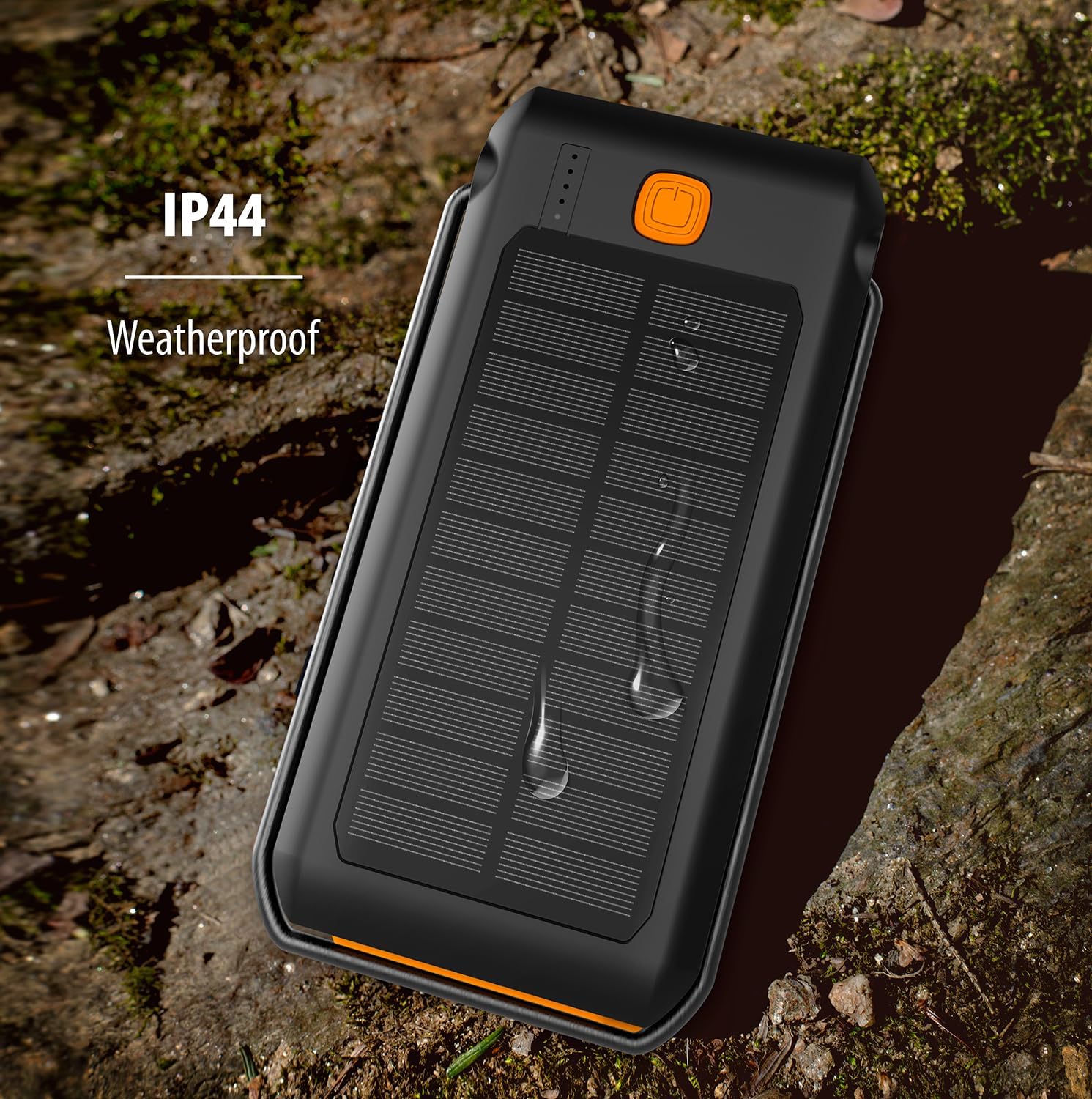 Image of the ToughTested power bank with water droplets on its solar panel, illustrating its IP44 weatherproof rating.
