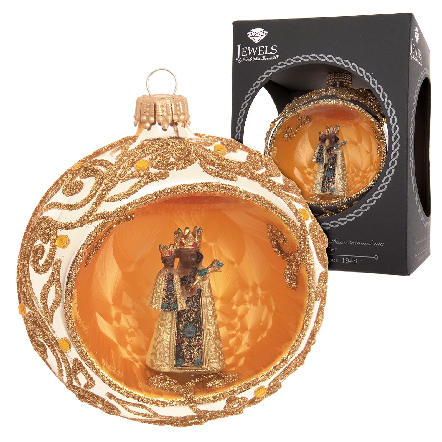 Boule de Noël strass et Vierge noire pour rompre avec les décors banals
