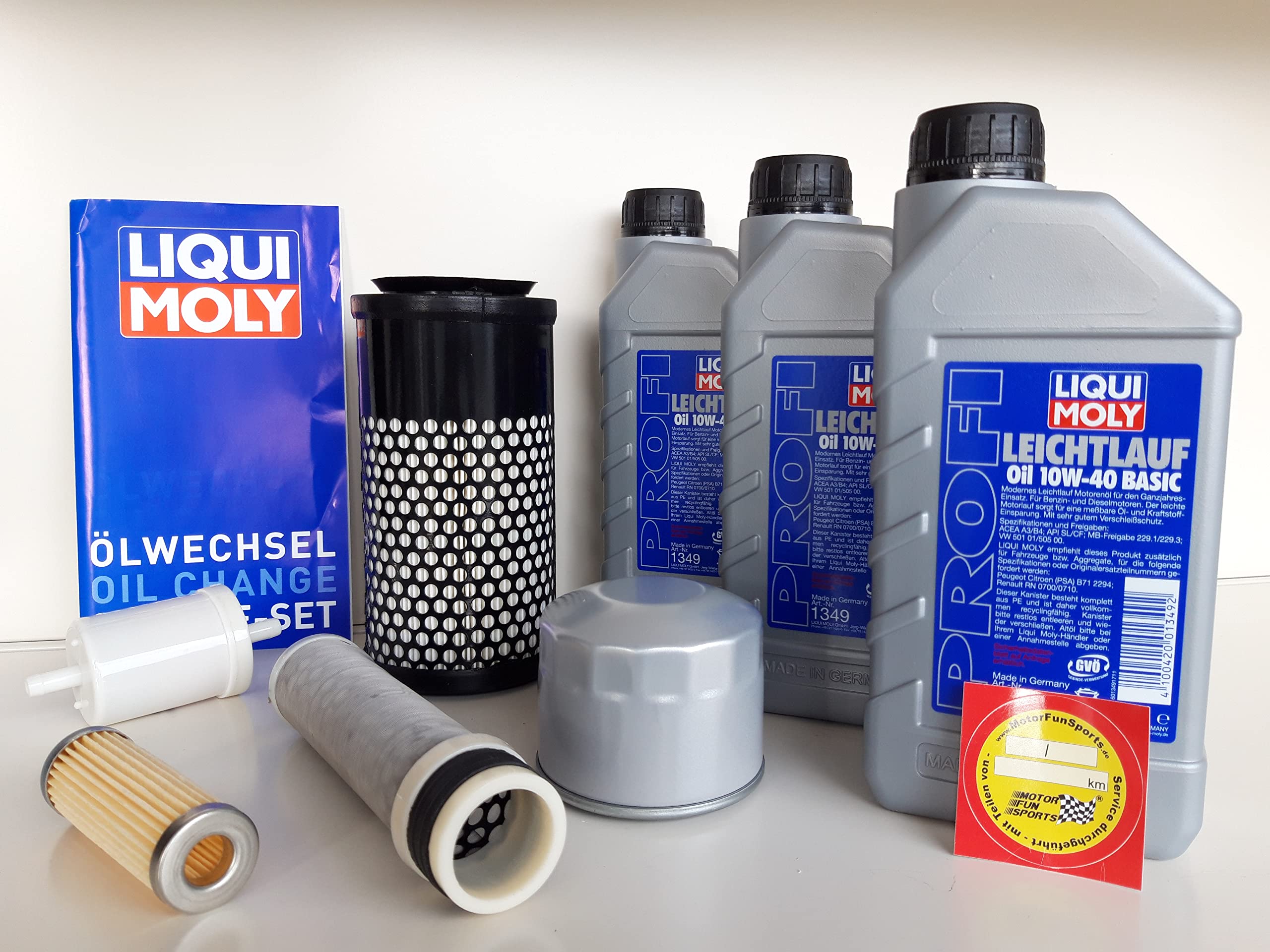 Kit de mantenimiento adecuado para Kubota K 008-3 con aceite y filtro