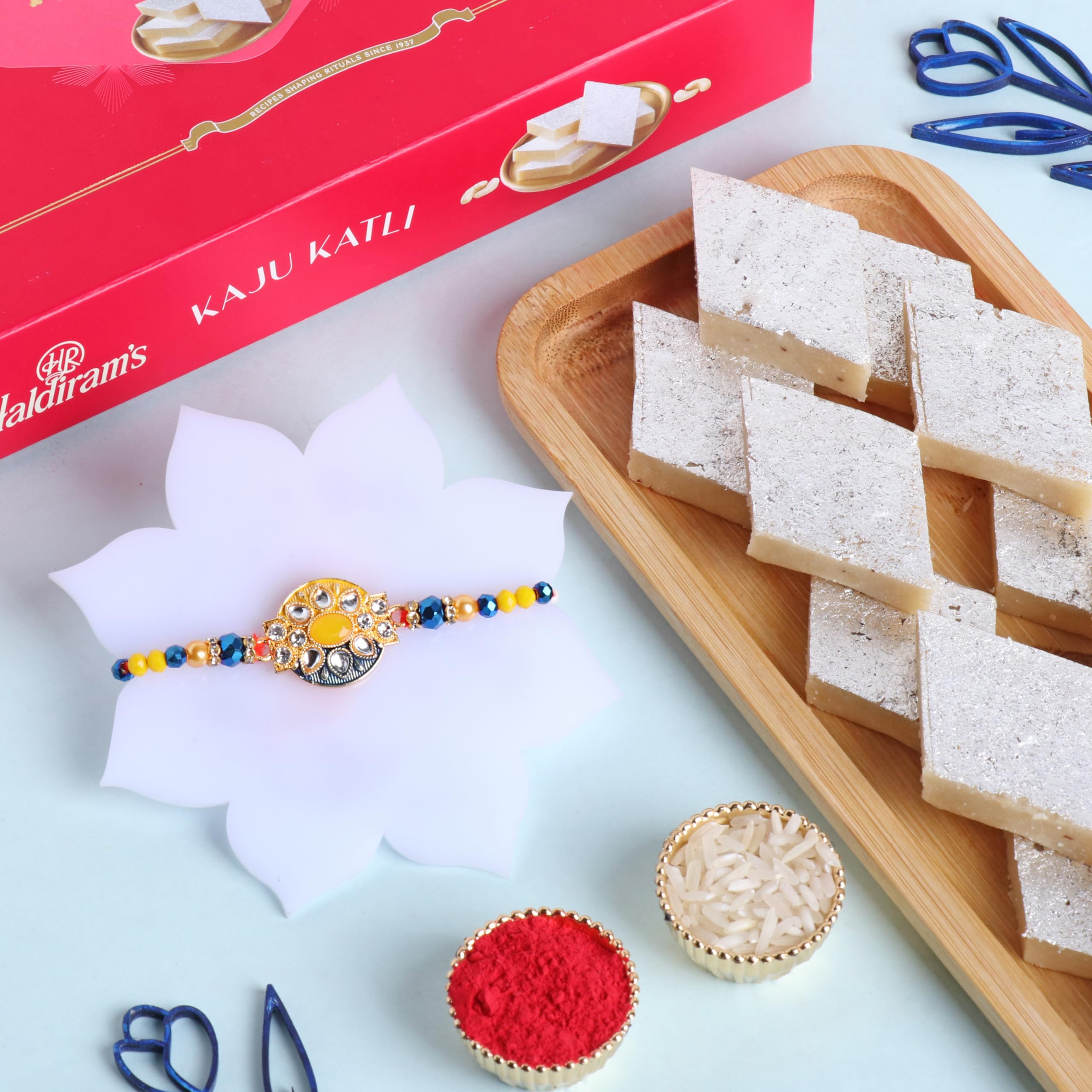 Floweraura Raksha Bandhan Celebrations Yellow And Blue Beaded Kundan Rakhi With 250 Gram Kaju Katli - Rakhi For Brother, Bhai, Cousins & Raksha Bandhan Gift (Same Day Delivery) (B0D9B6CKQ1) Amazon Price History, Amazon Price Tracker