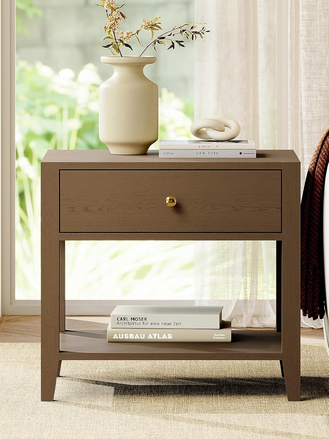Close-up of the ModernMate end table's drawer, slightly open, revealing the smooth metal slides and interior space.