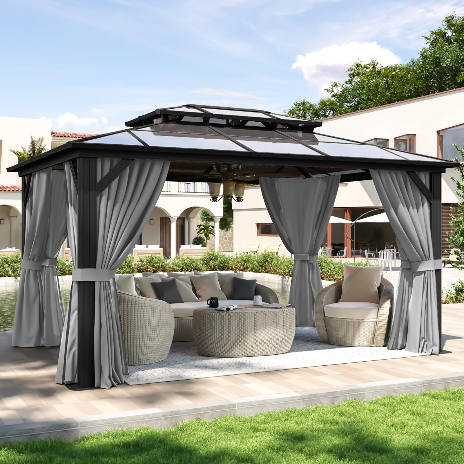 Aoxun 10x14 Hardtop Gazebo set up in a backyard with outdoor furniture and string lights