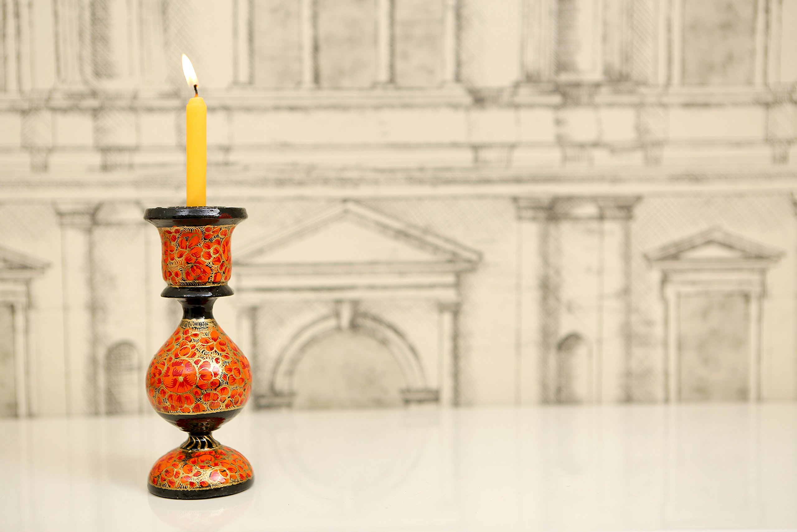 Porte-bougie coloré en papier mâché orange pour illuminer vos tables de fête