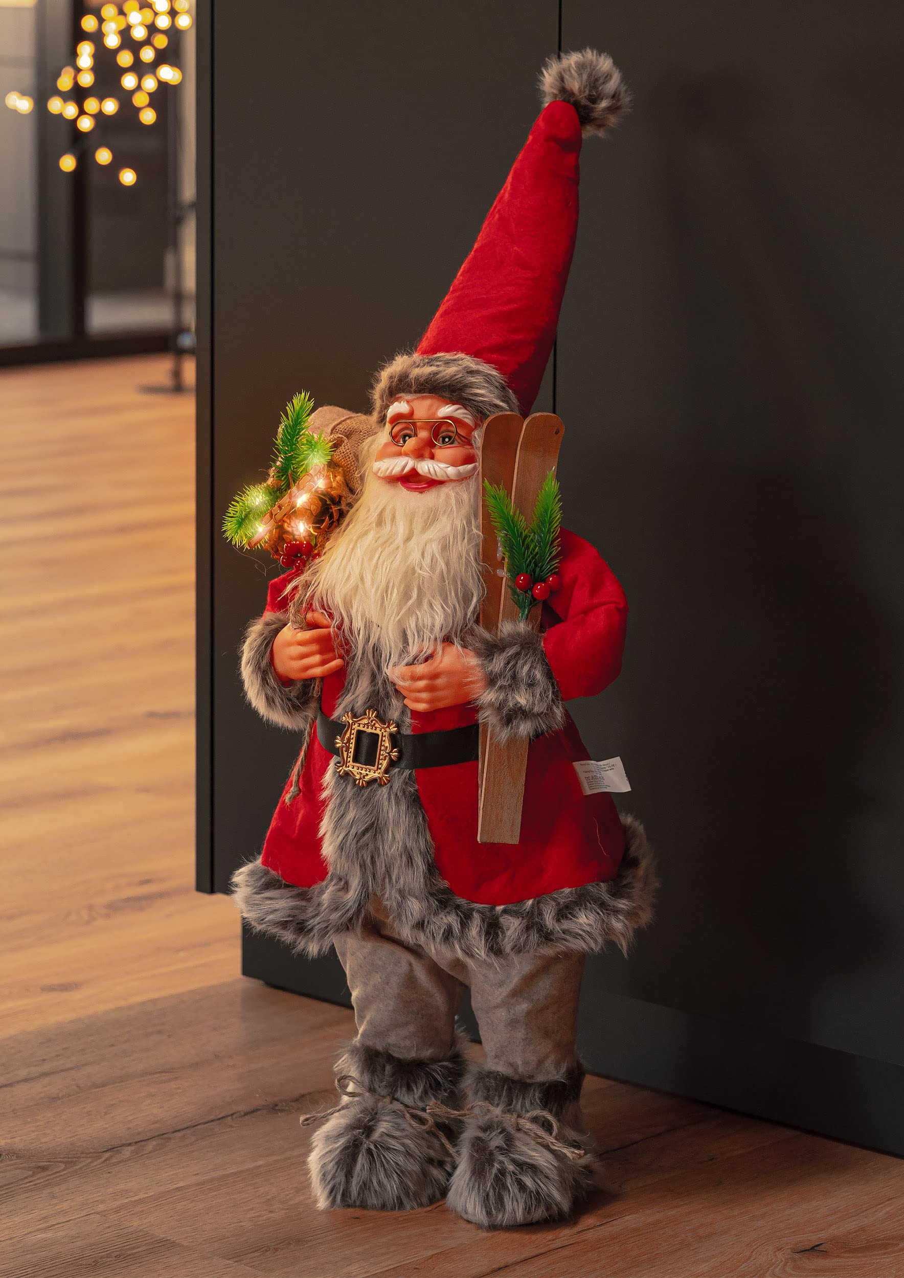 Bonetti LED Weihnachtsmann Figur mit warm-weißen Lichtern beleuchtet, Höhe der Dekofigur ca. 60 cm