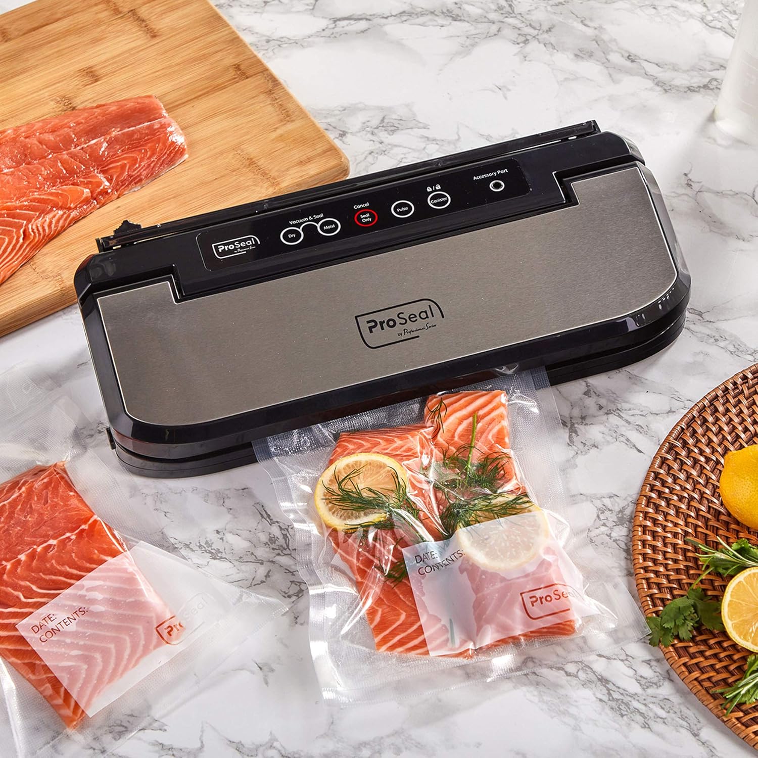 ProSeal Vacuum Sealer on a kitchen counter with sealed and unsealed salmon portions.