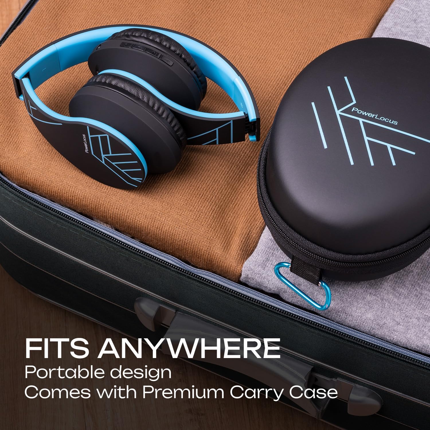 Folded PowerLocus P2 headphones and their hard shell carry case placed inside a suitcase, demonstrating portability.