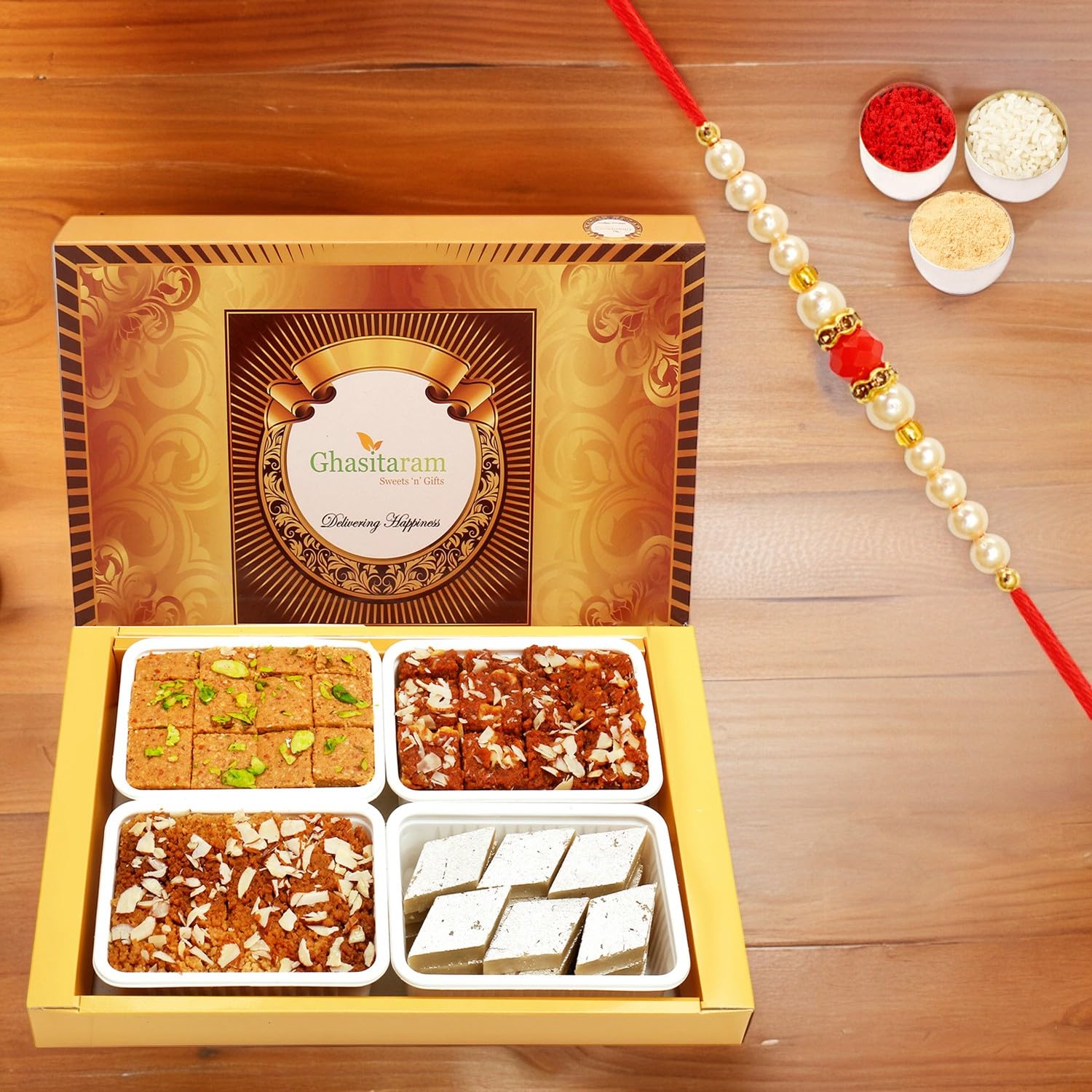 Ghasitaram Gifts Rakhi Gifts for Brothers Big Box of Kaju Katli, Besan Barfi, Dodha Barfi and Milk Cake with Pearl Beads Rakhi (B07X7N8VB6) Amazon Price History, Amazon Price Tracker