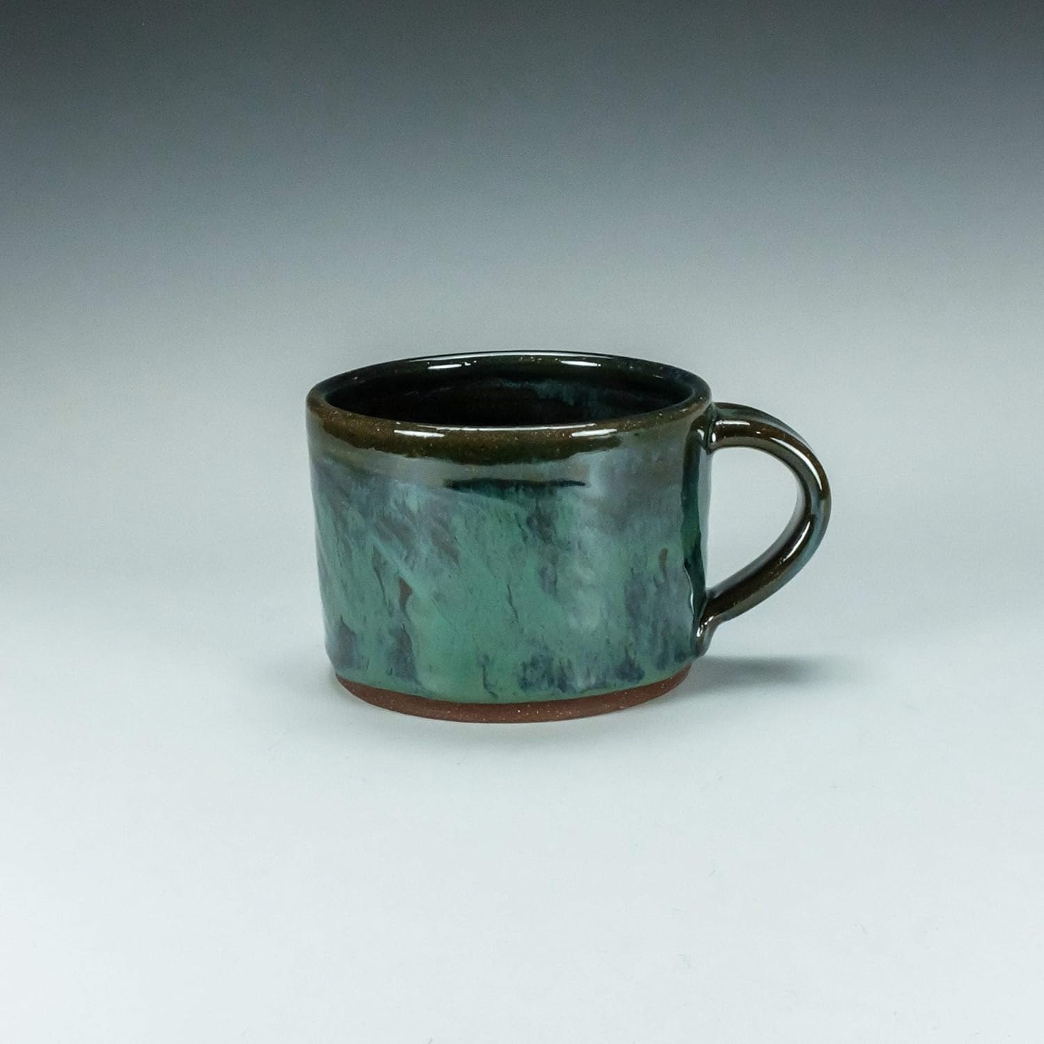 Stoneware soup mug. Copper green with blue lip. Handmade