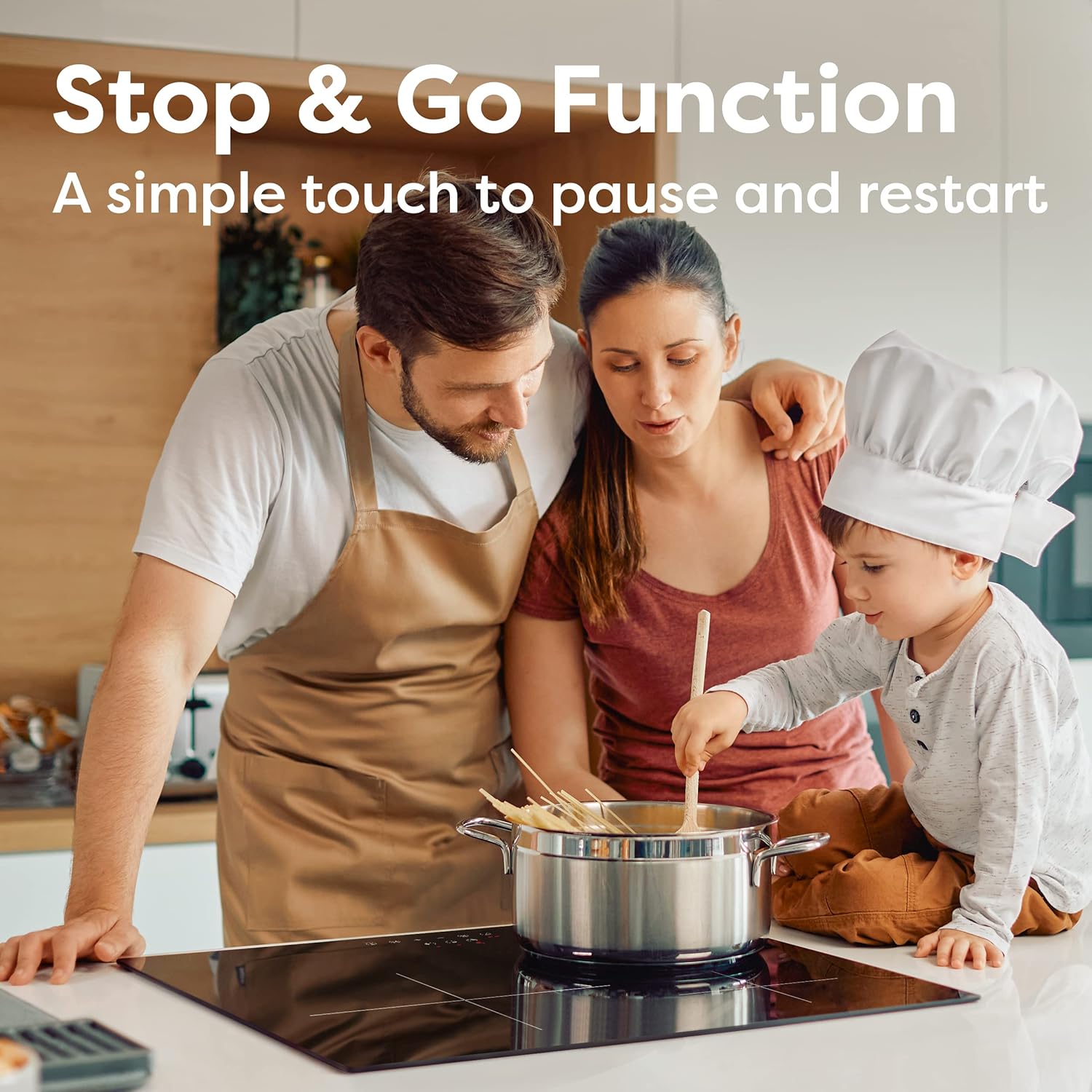 Family using the CIARRA CBBIH3 induction hob, demonstrating the Stop & Go function.