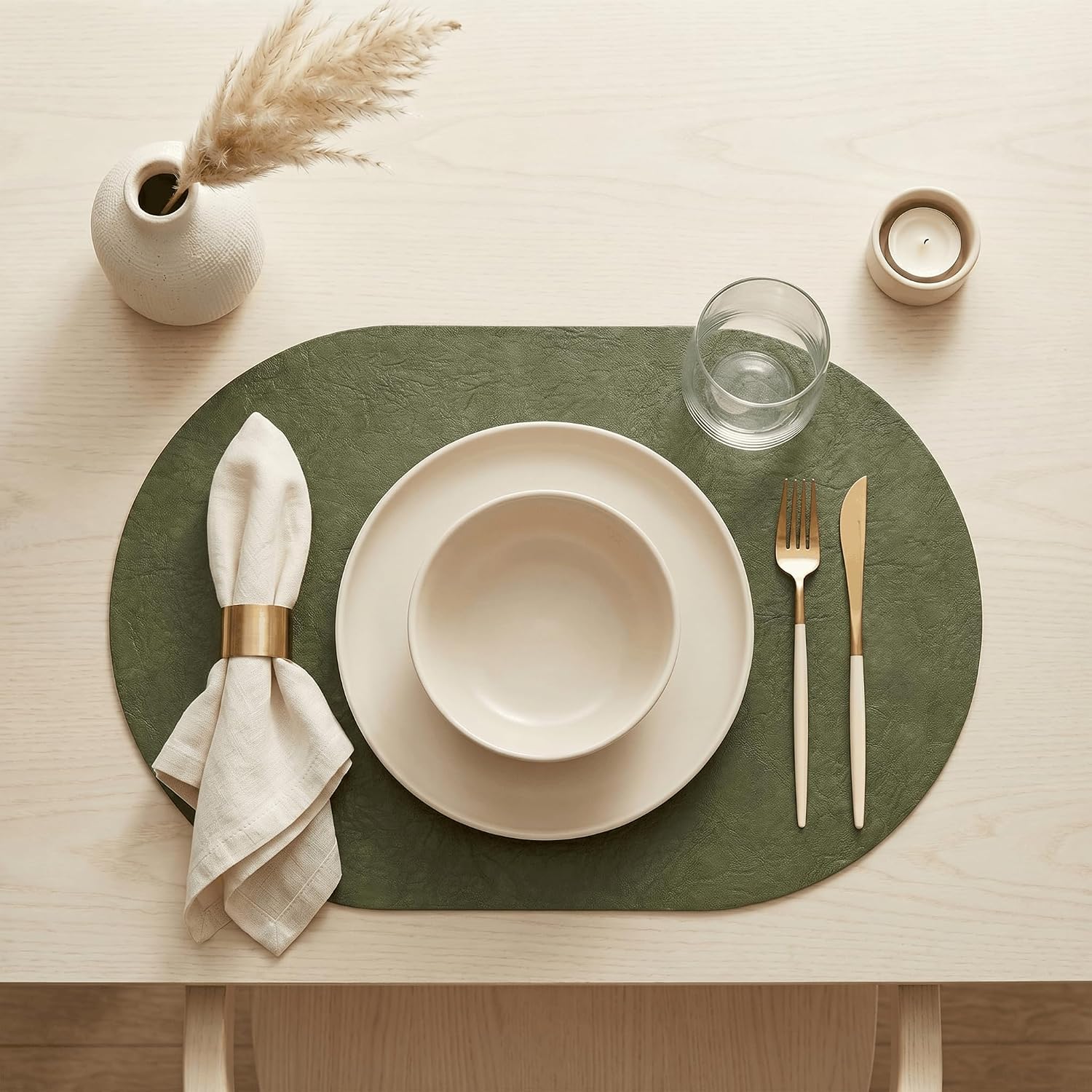 Artoid Mode Olive Green Faux Leather Oval Placemats Set of 4, 12 x 18 Inch Waterproof Wipeable Heat Resistant Vinyl Place Mats, Reversible Table Mats for Kitchen Dining Decor