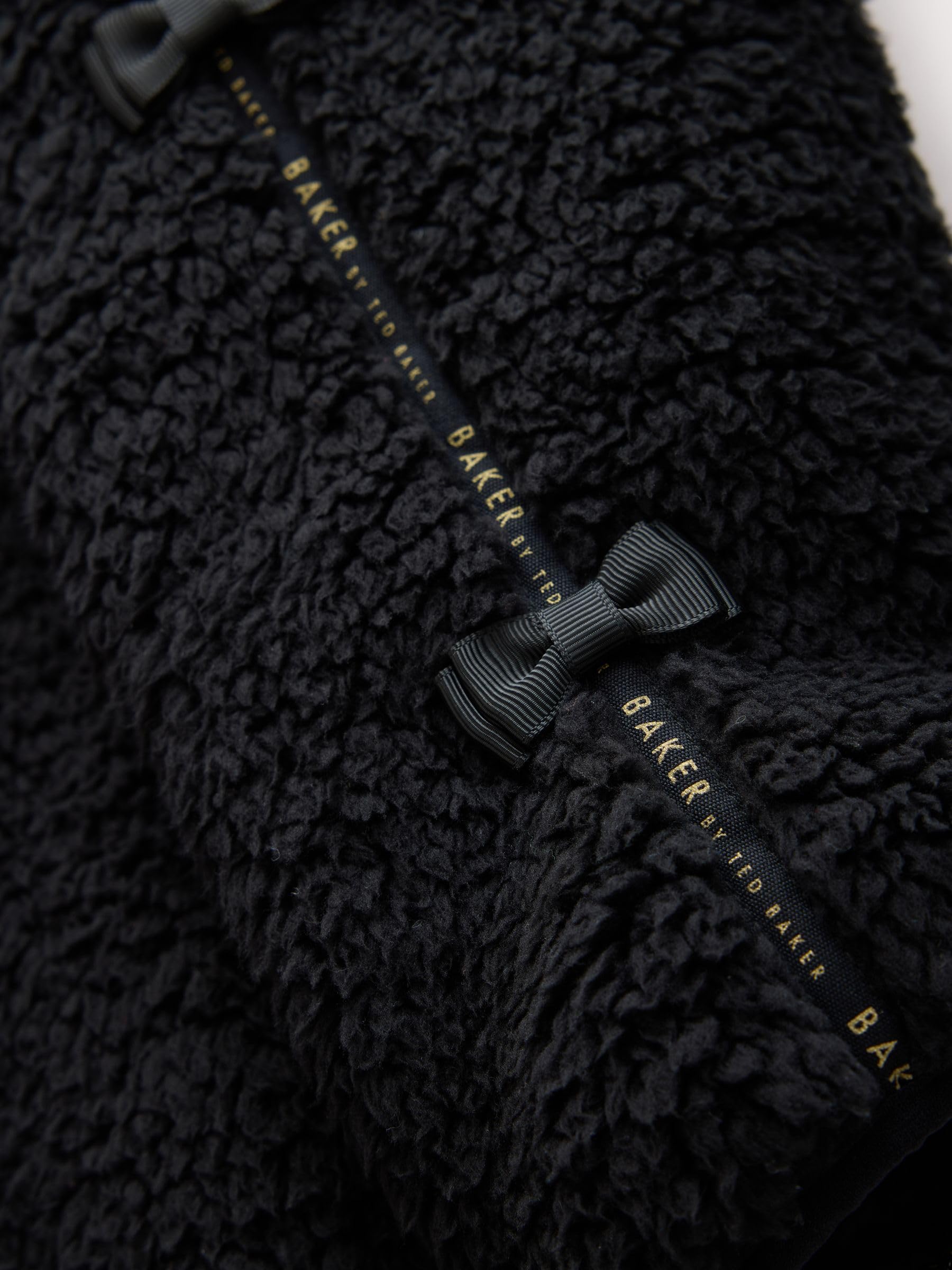 Niñas Polar negro con capucha, cremallera y lazo