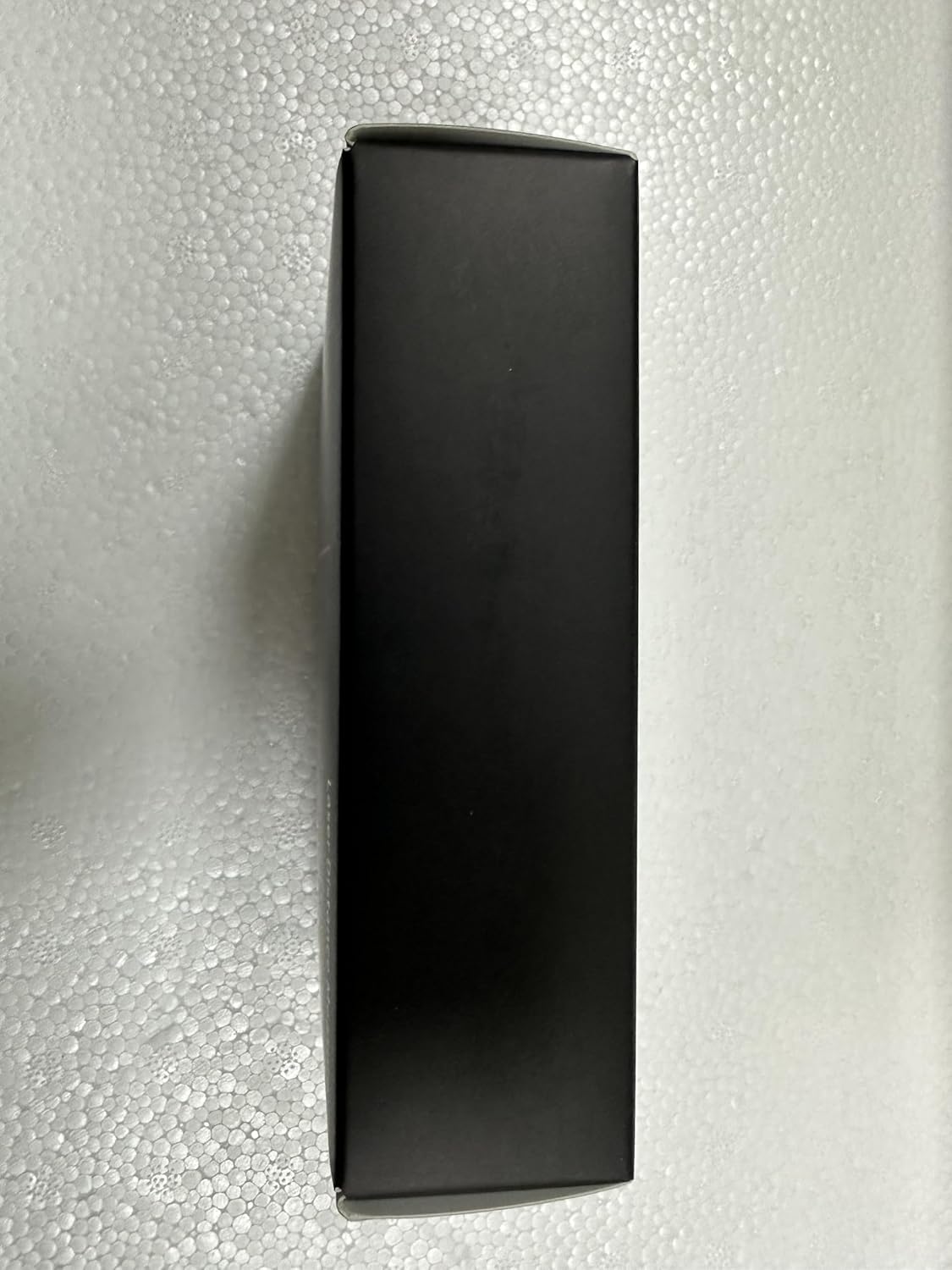 LOMVUM laser distance meter displaying different measurement units: feet, meters, and inches