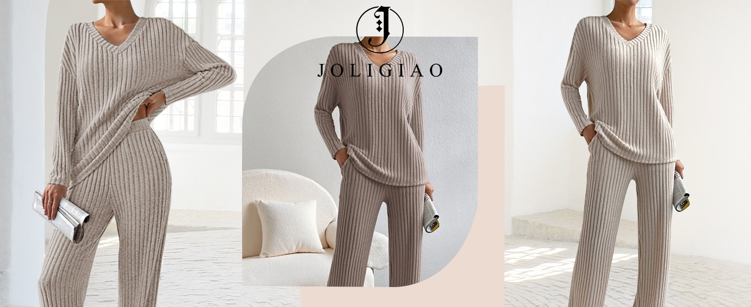 Moderna tuta da casa oversize con colletto alto, maniche ampie e pantaloni larghi con tasche