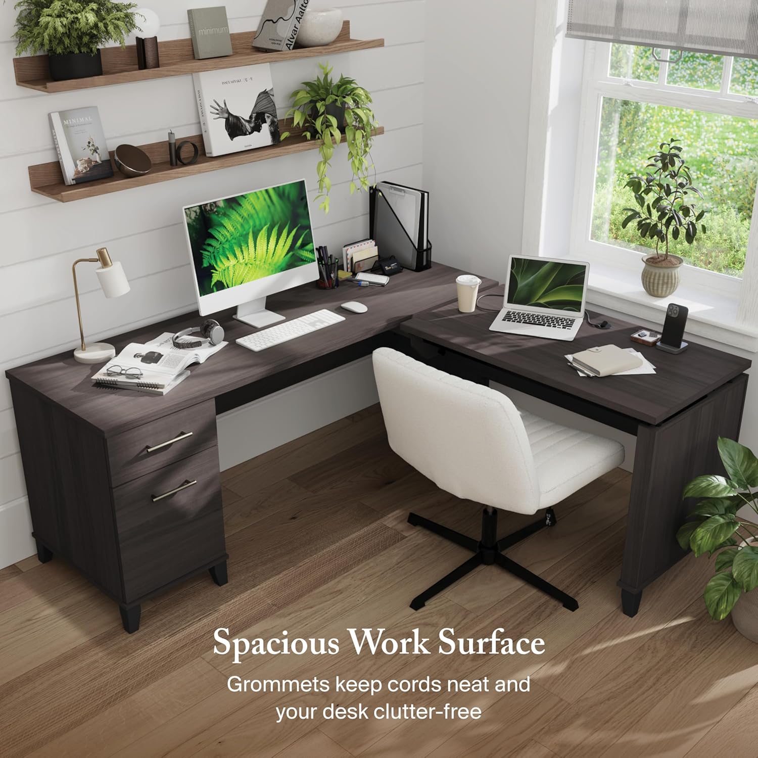Spacious work surface with wire management grommets