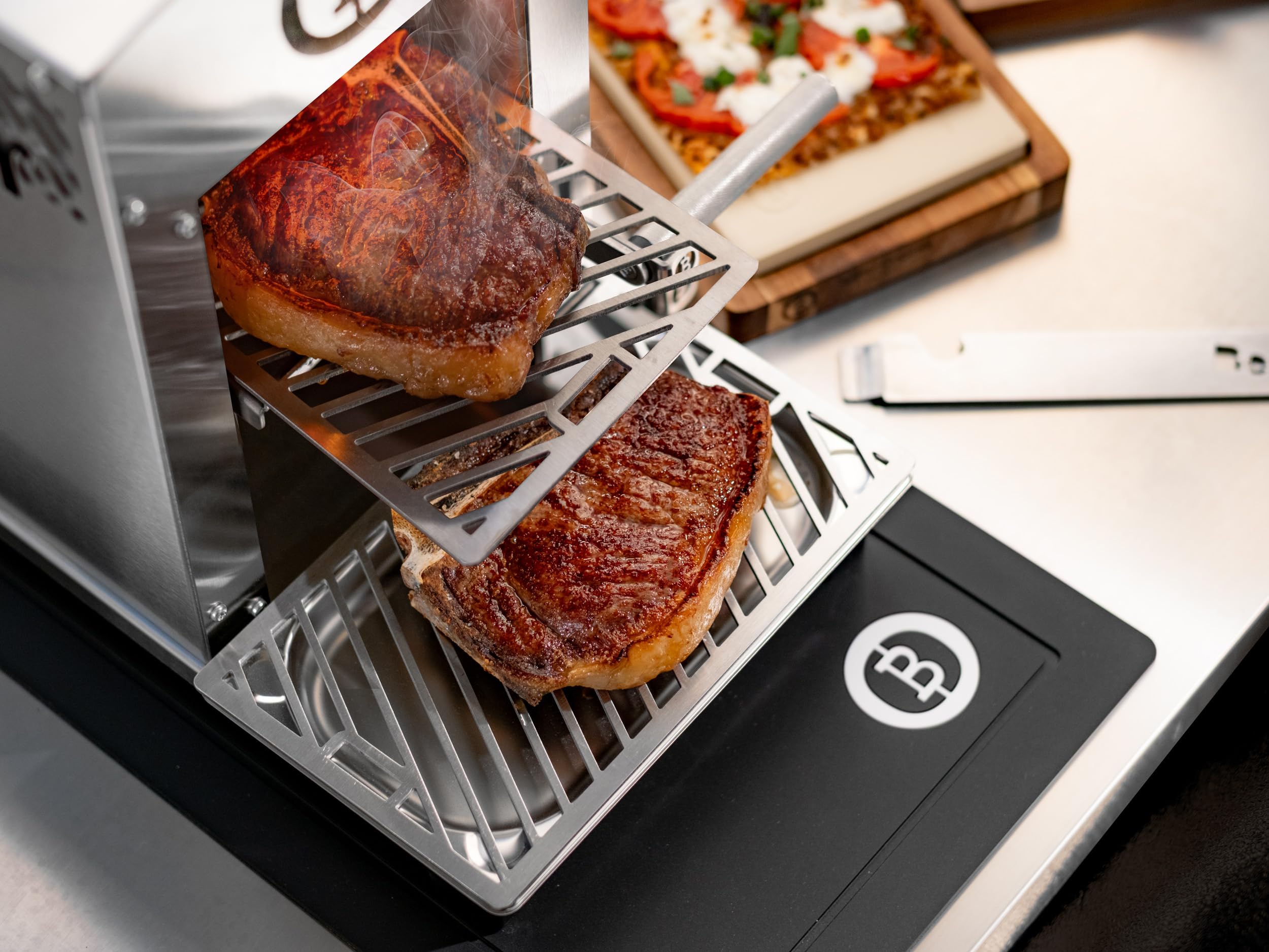 E-Beefer Pro II – Elektrischer Oberhitzegrill | 800 °C | Patentierte Einhand-Höhenverstellung | Neue Keramikbrenner-Generation | 1.800 W | Kein Gas | Haushaltssteckdose 220–240 V | DIN 60335