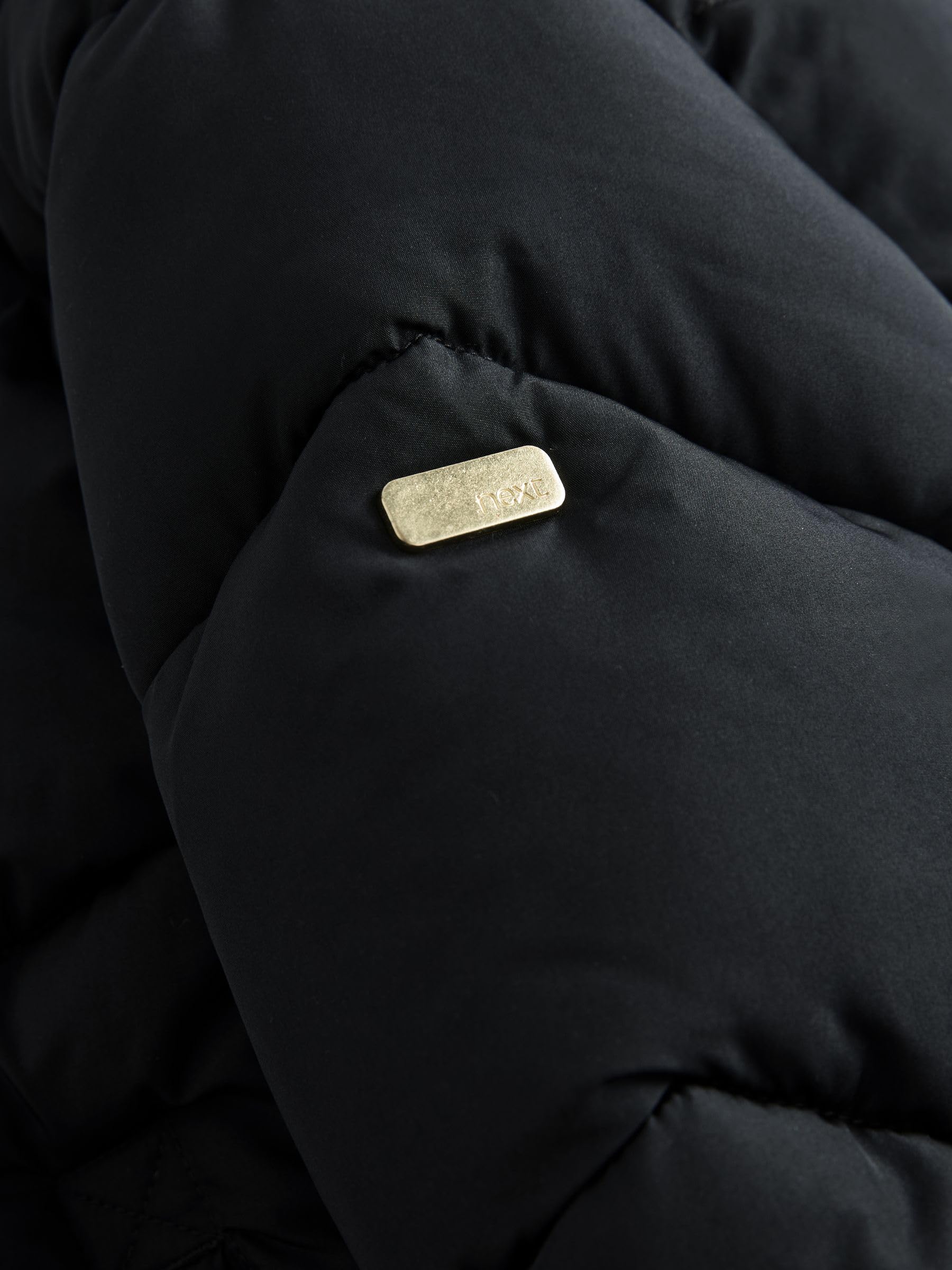 NEXT Niñas Abrigo acolchado con capucha, forro de pelo sintético y diseño impermeable