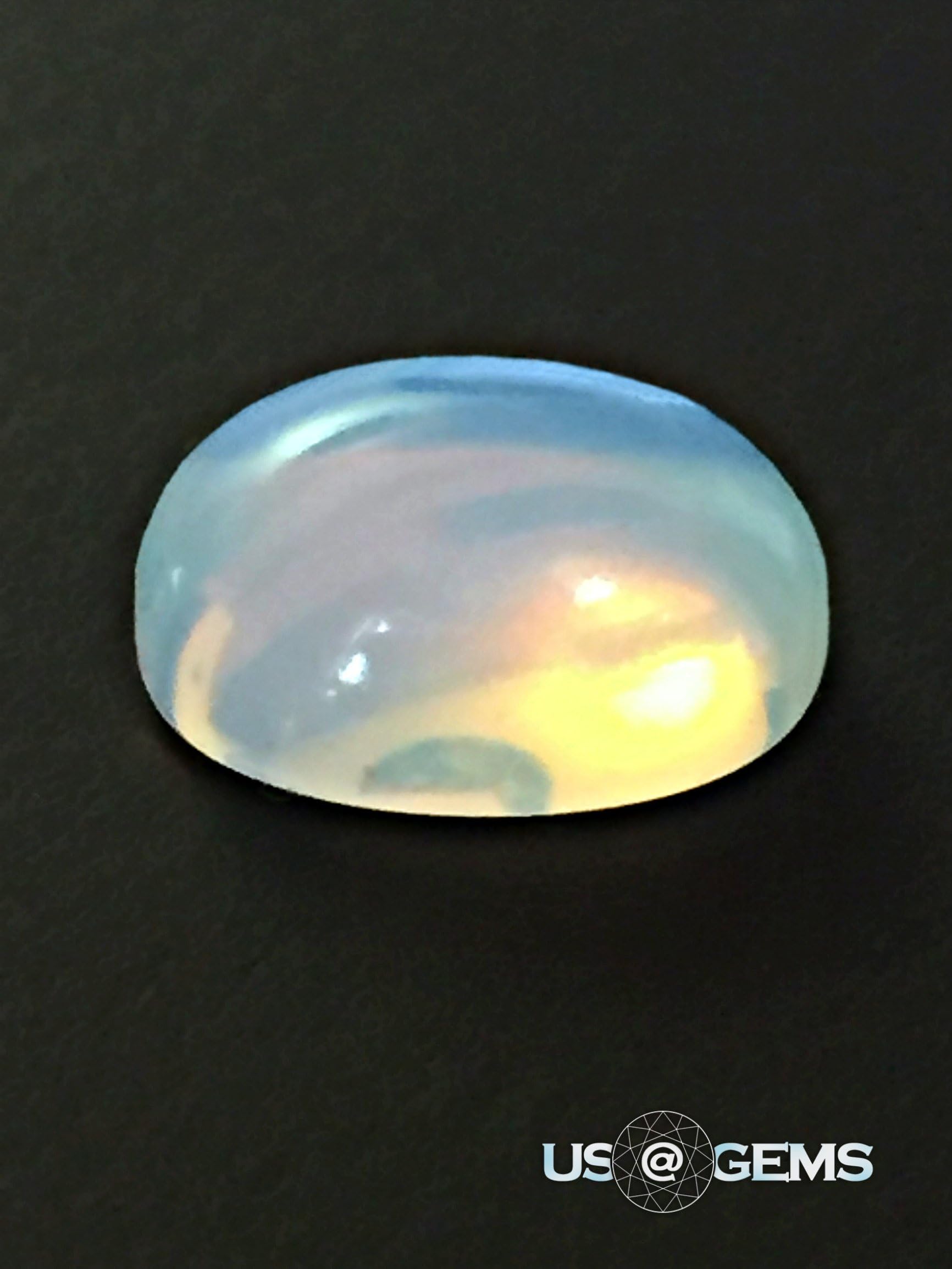 Opal White. Cabochon Oval 10x8 mm. 2,75 Ct. created gemstone. US@GEMS