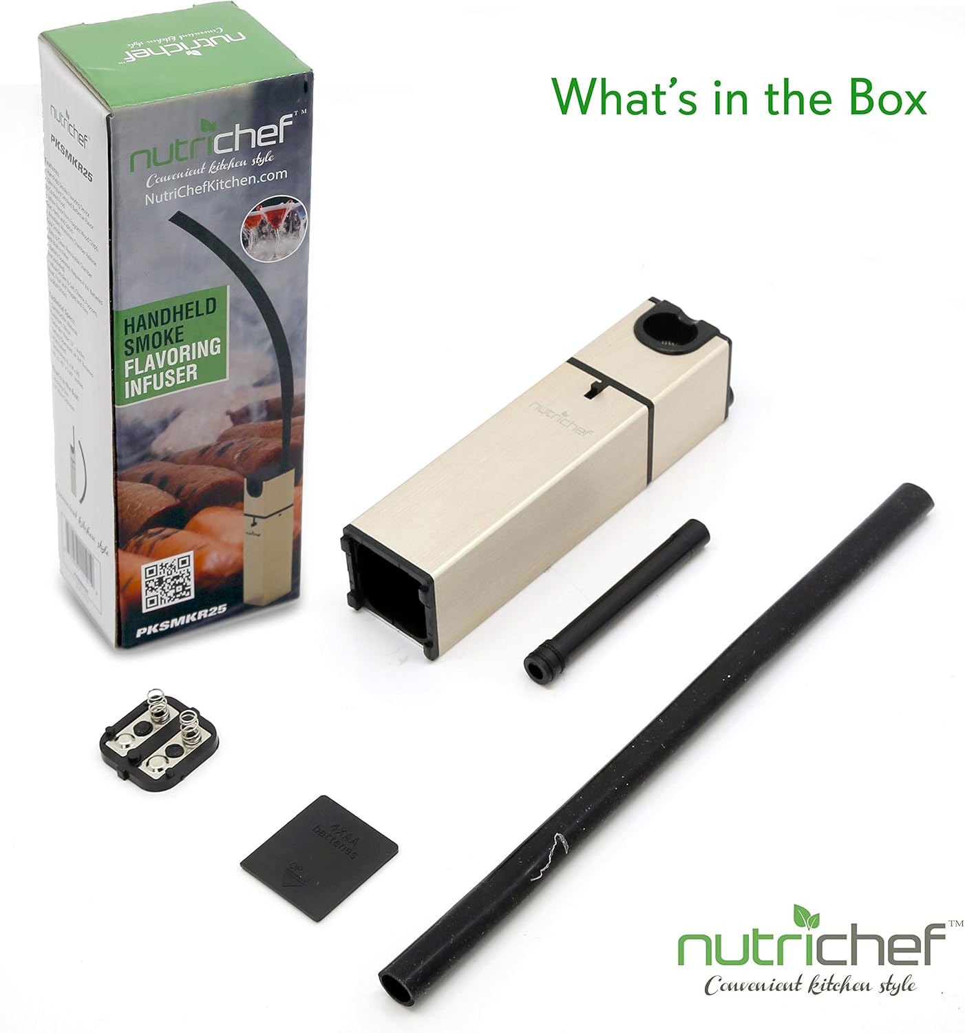 Contents of the NutriChef PKSMKR25 box, including the main smoker unit, a hose, and a battery compartment cover.