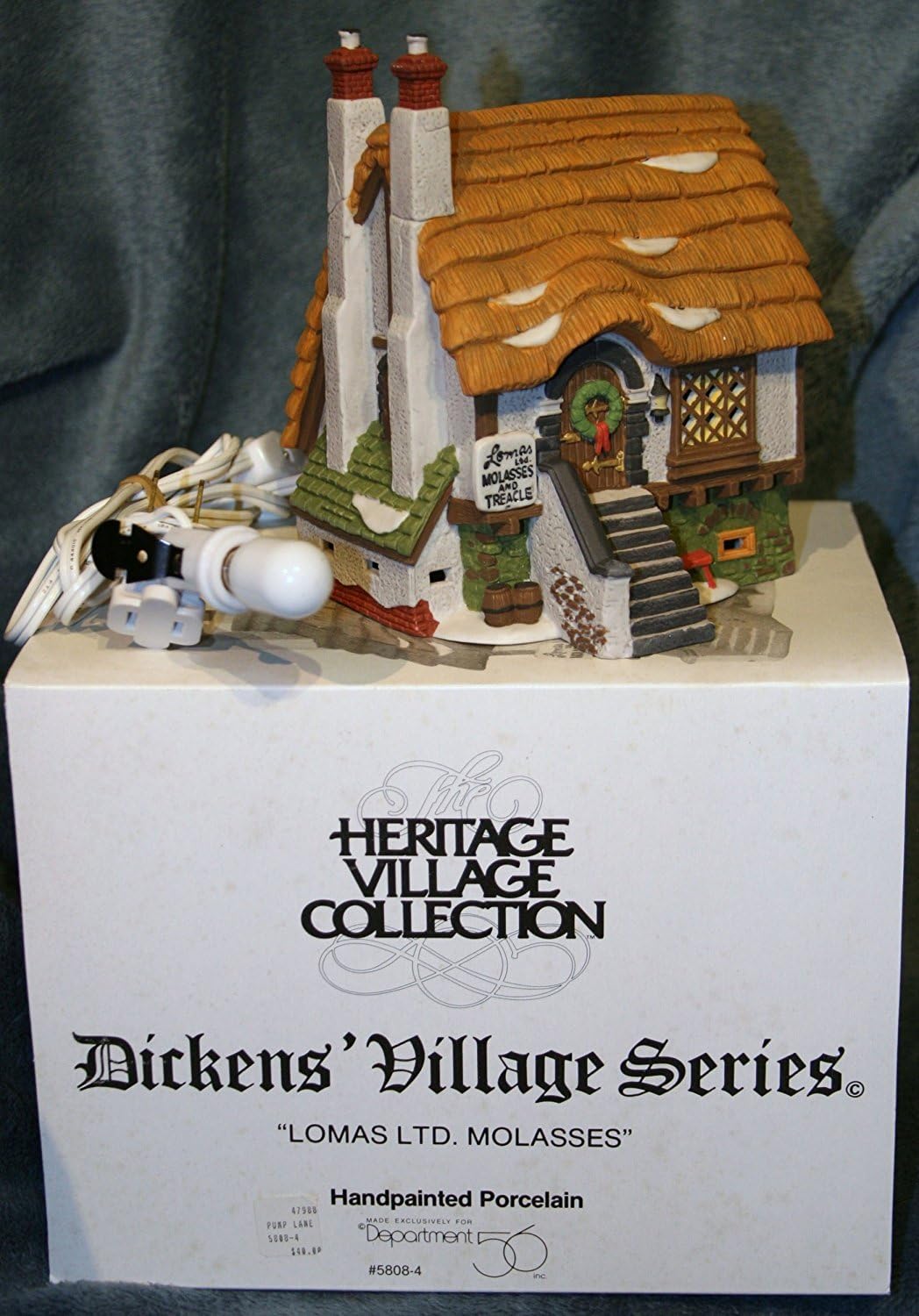 Department 56 "Lomas Ltd. Molasses" Heritage Village Shop