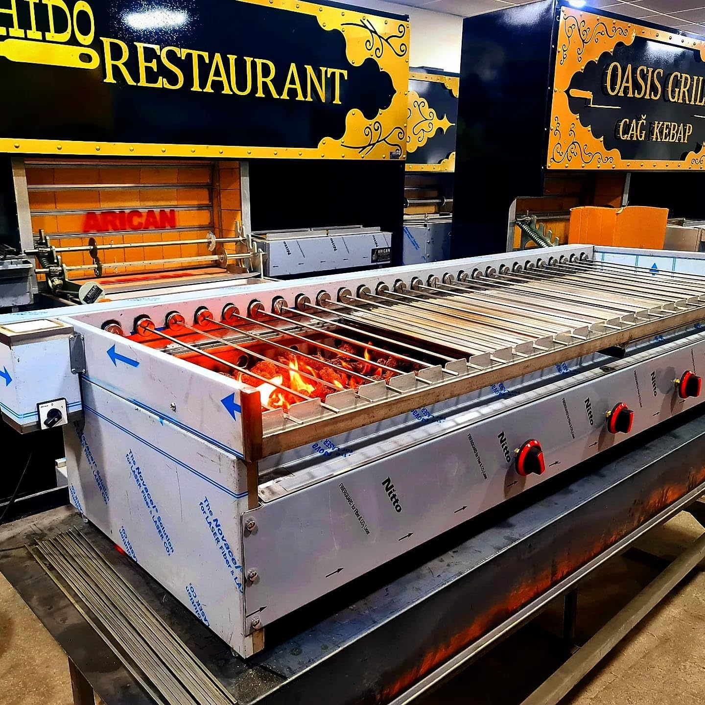 Automatic Turning Skewers Gas and Lava Stone Commercial Grill