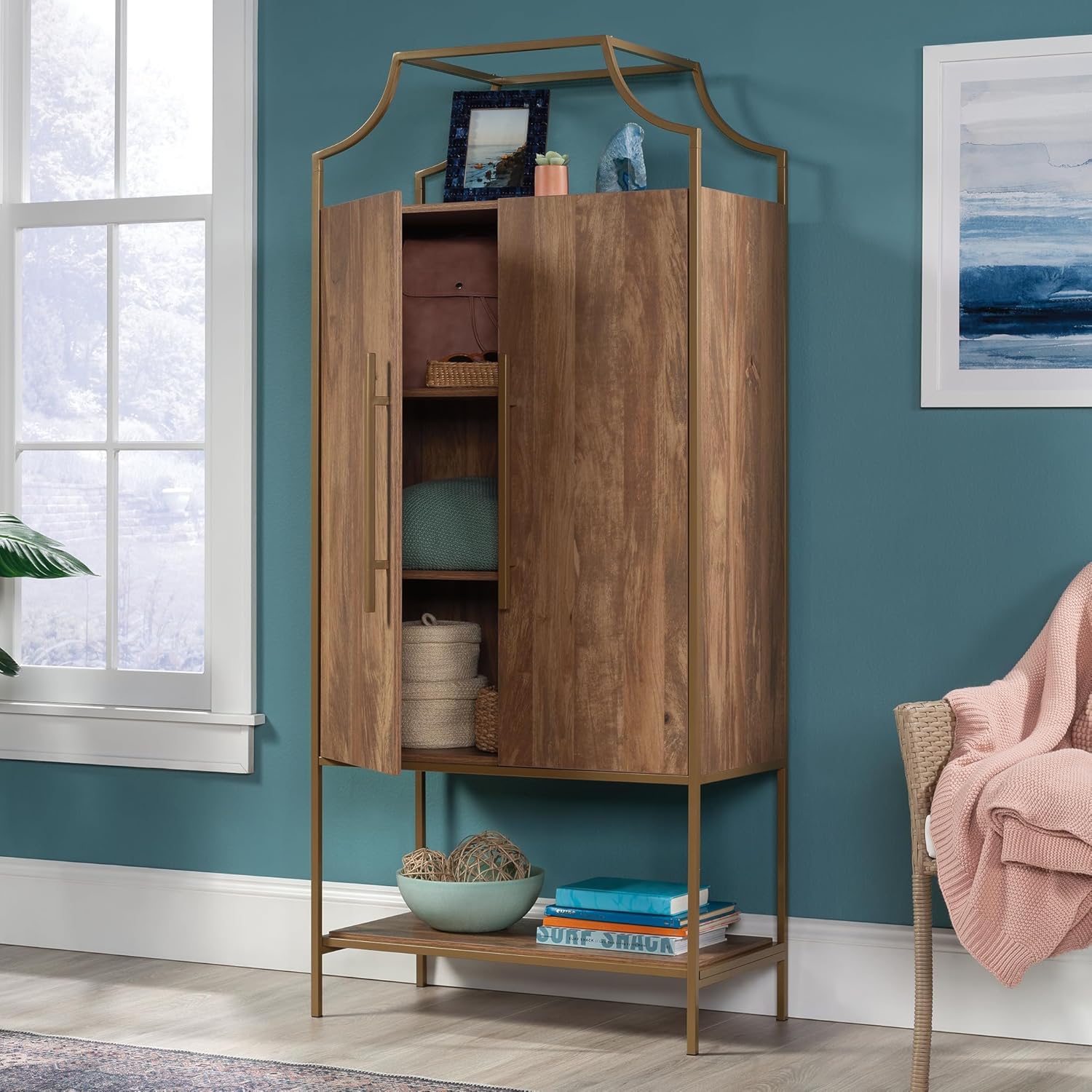 Close-up of the cabinet's gold-finished handles