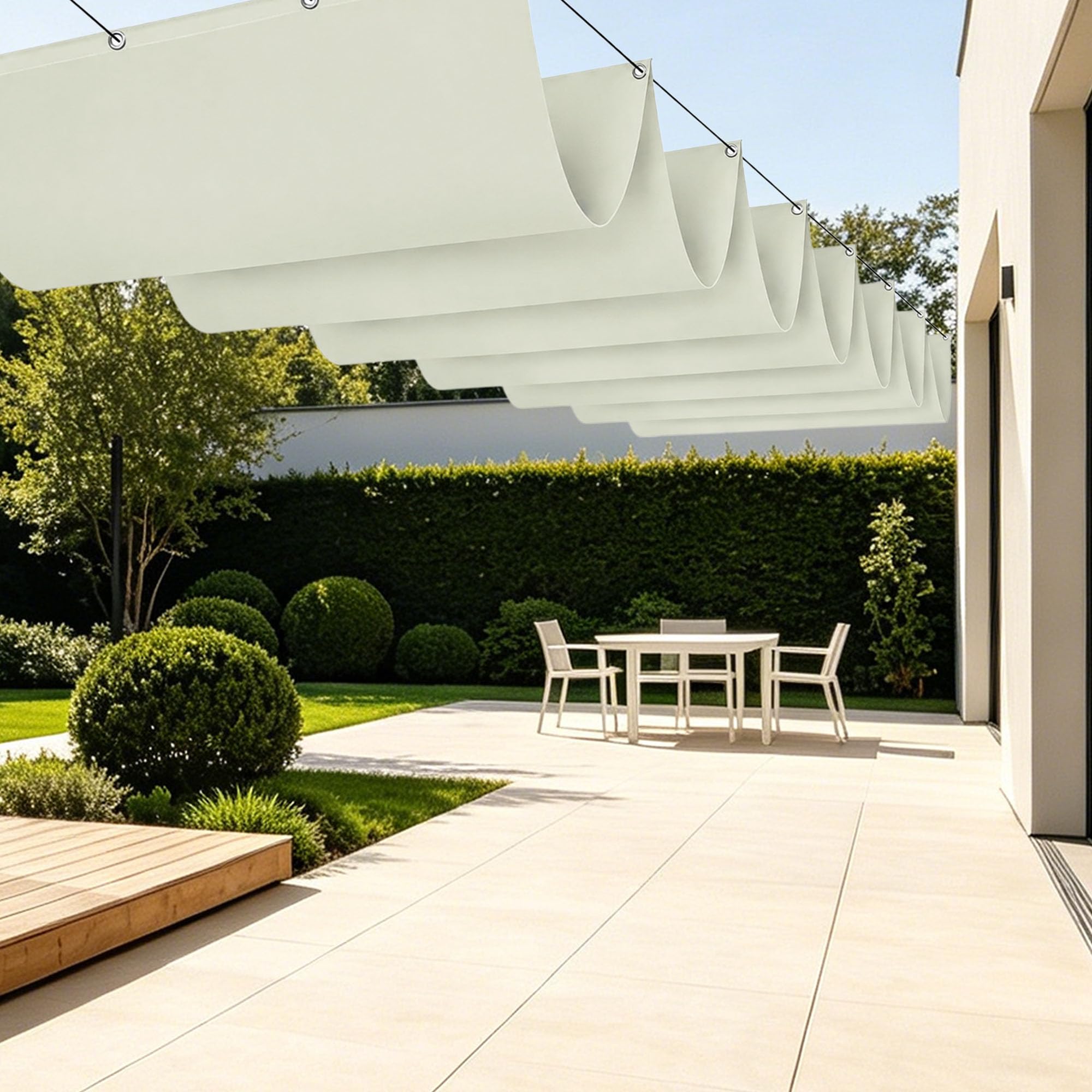 Voiles d'ombrage rétractable sur votre terrasse pour des déjeuners à l'ombre