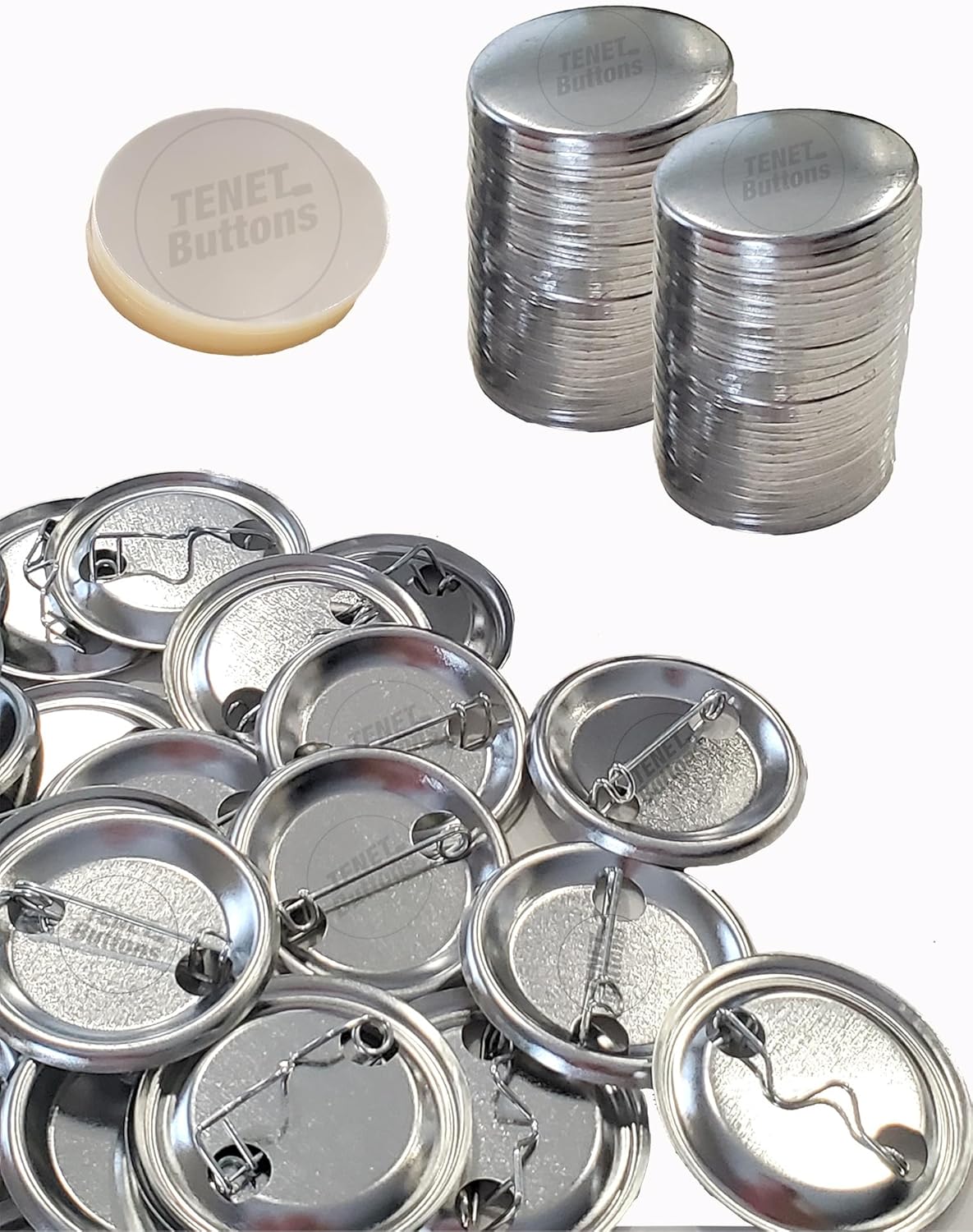 Stacks of metal button shells and pin-backs, with a pile of clear Mylar films.
