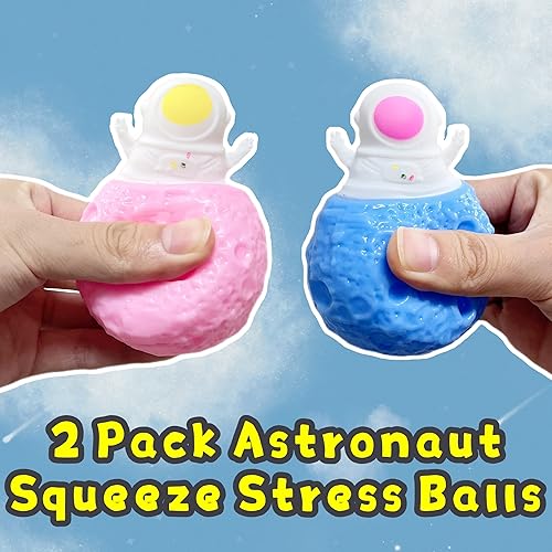 Vista 5 de Bolas de astronauta para el estrés para niños, juguetes sensoriales esponjosos (paquete de 2) Bola para apretar, juguetes para aliviar el estrés