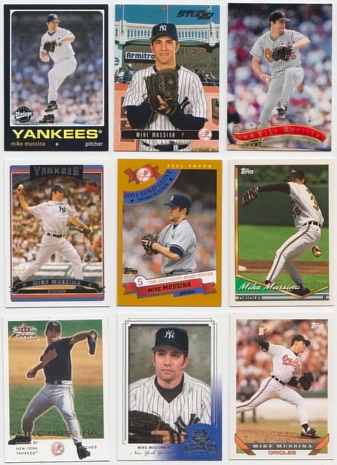 Mike Mussina / 50 Different Baseball Cards Featuring Mike Mussina including a Game Used Card