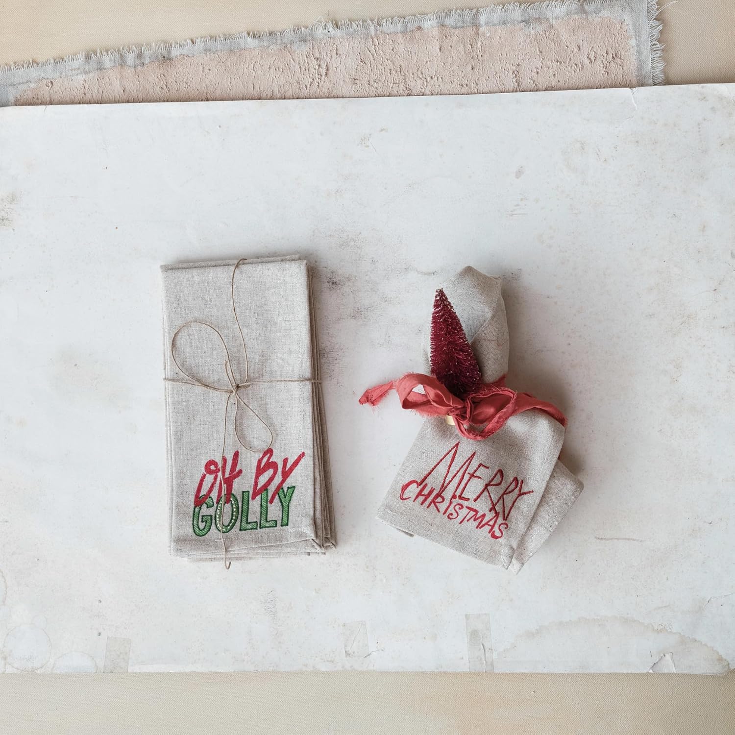 Creative Co-Op Cotton Christmas Napkins with Embroidered Sayings, Multicolor, Set of 4