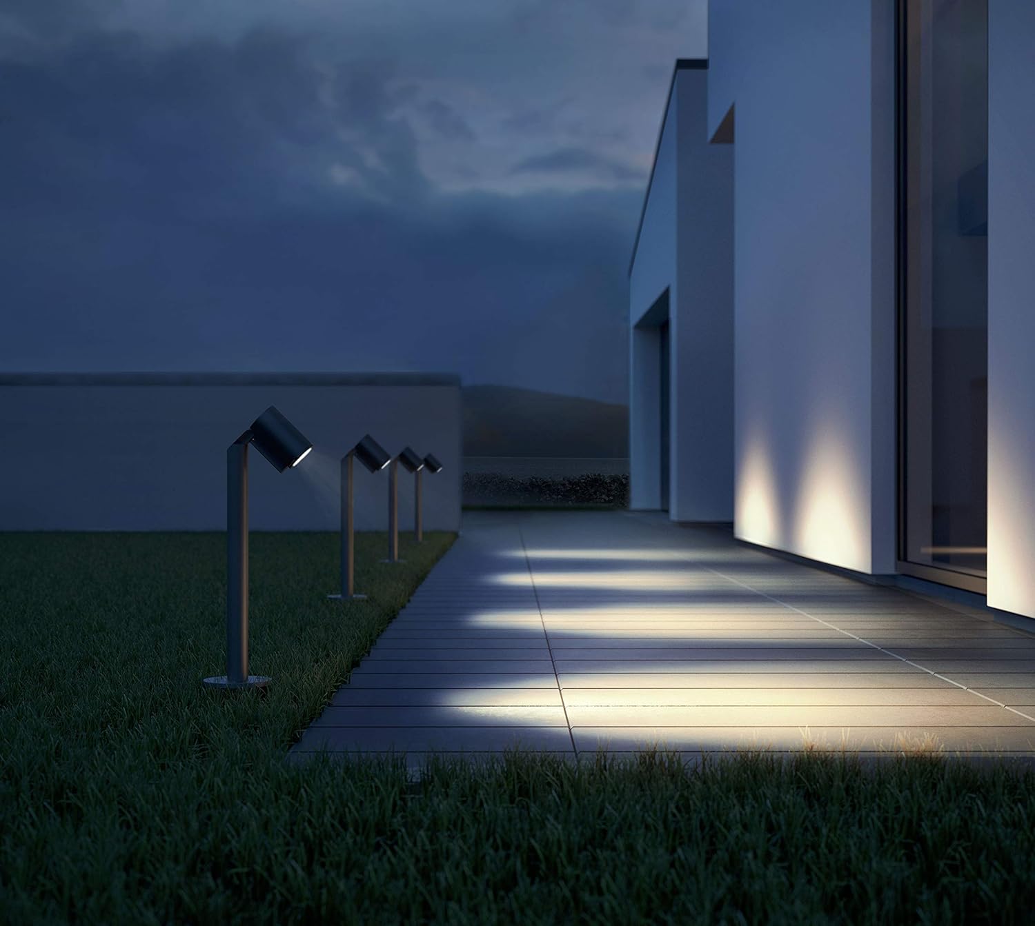 Steinel LED-spot Way N path lights illuminating a pathway at dusk