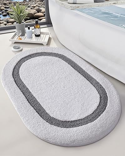 LUMI Alfombra de baño ovalada blanca de 17 x 30 pulgadas, antideslizante, lavable, alfombra de baño suave y absorbente con microfibra de secado