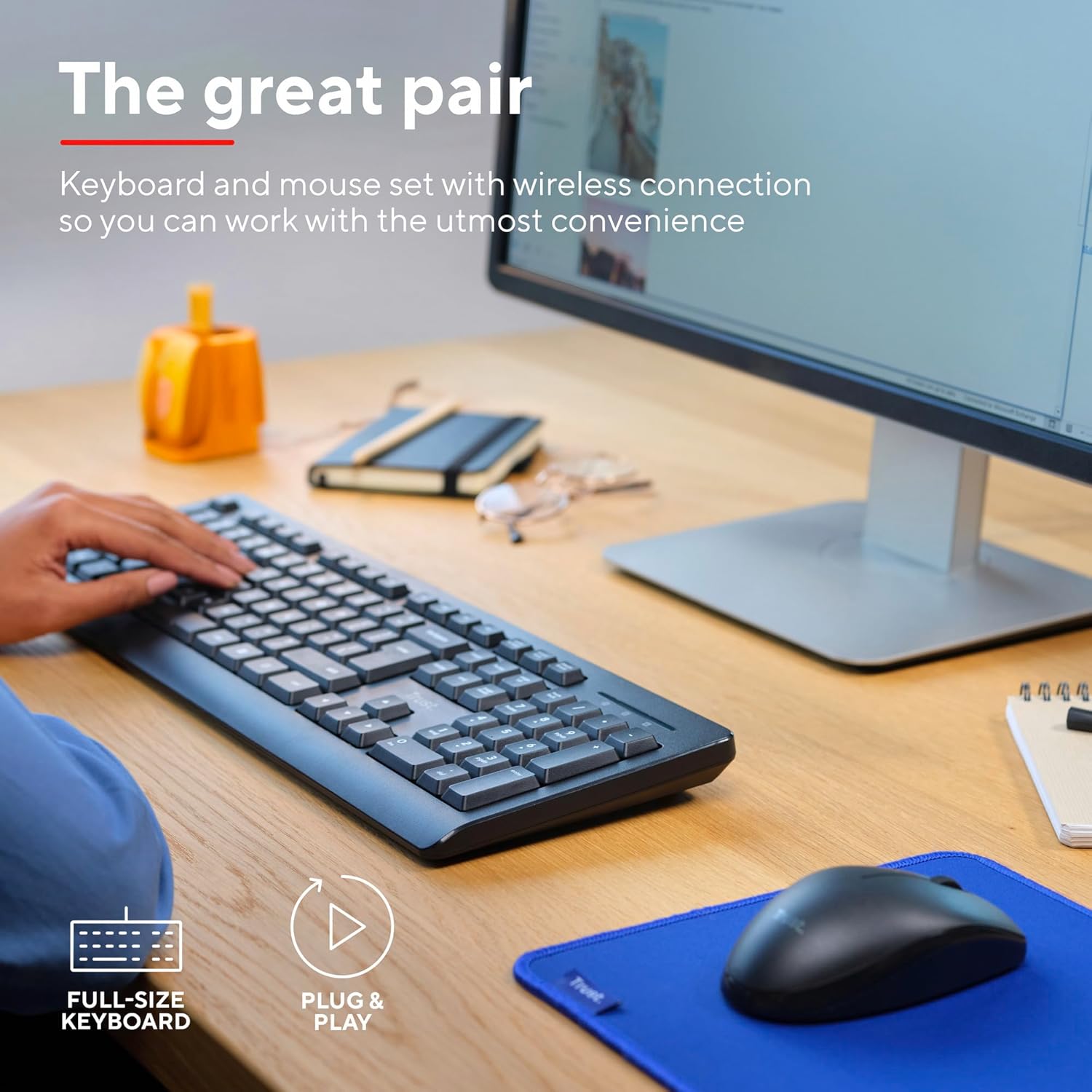 Person using the Trust Primo Pack keyboard and mouse