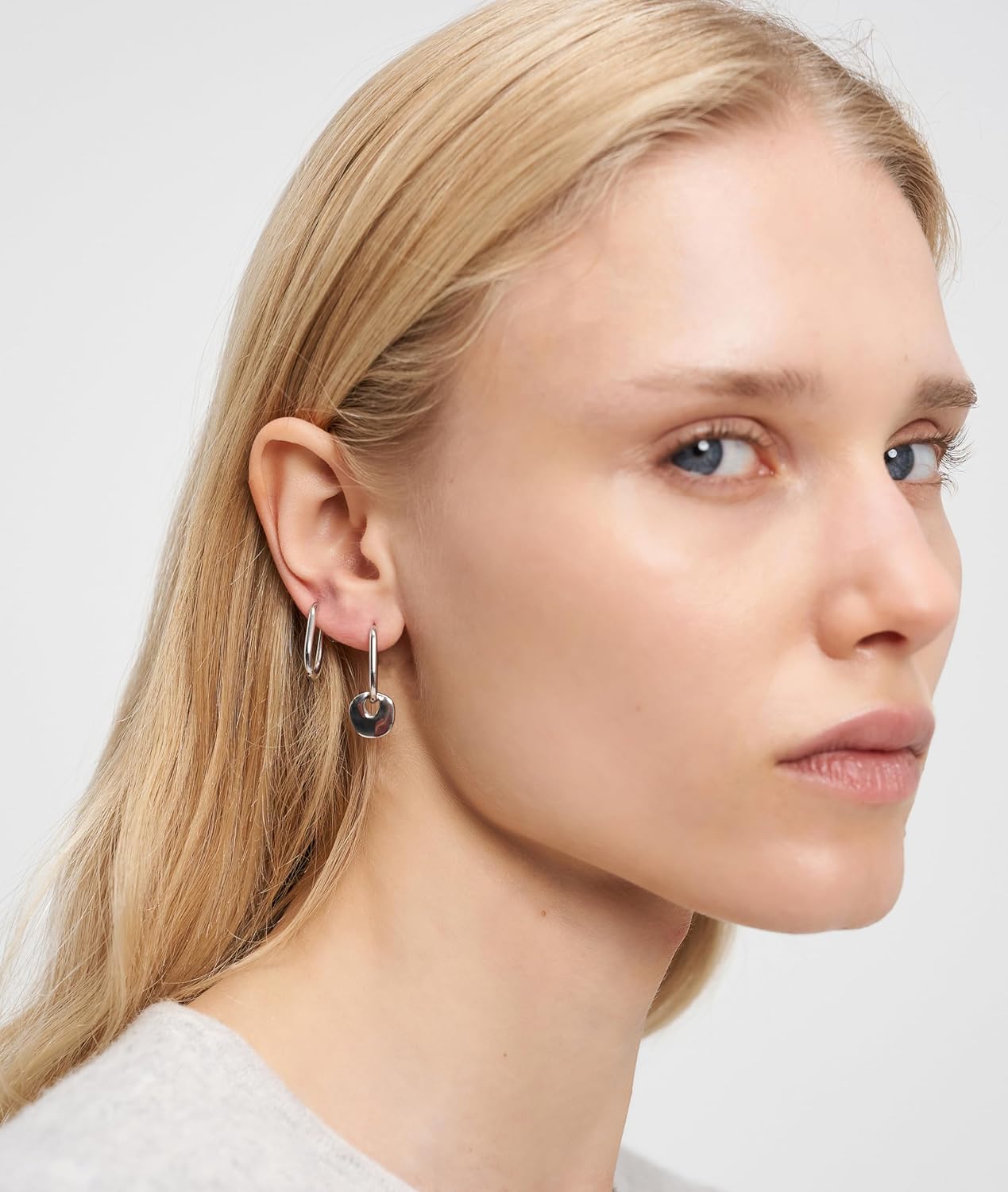LIEBESKIND Berlin women's jewellery, necklace, bracelet and earrings with organic elements made of stainless steel, supple pendants vary dynamically in shape and size and give thanks to their shimmer image 5