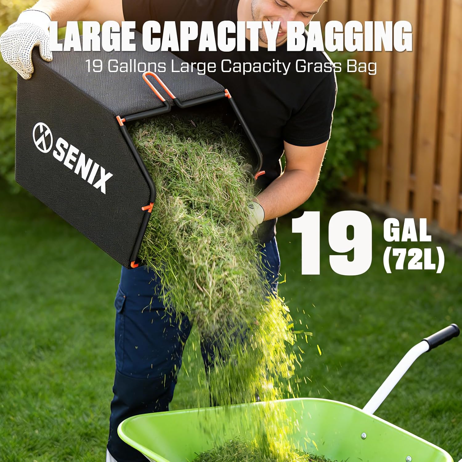 Person cleaning the underside of a SENIX lawn mower with a garden hose