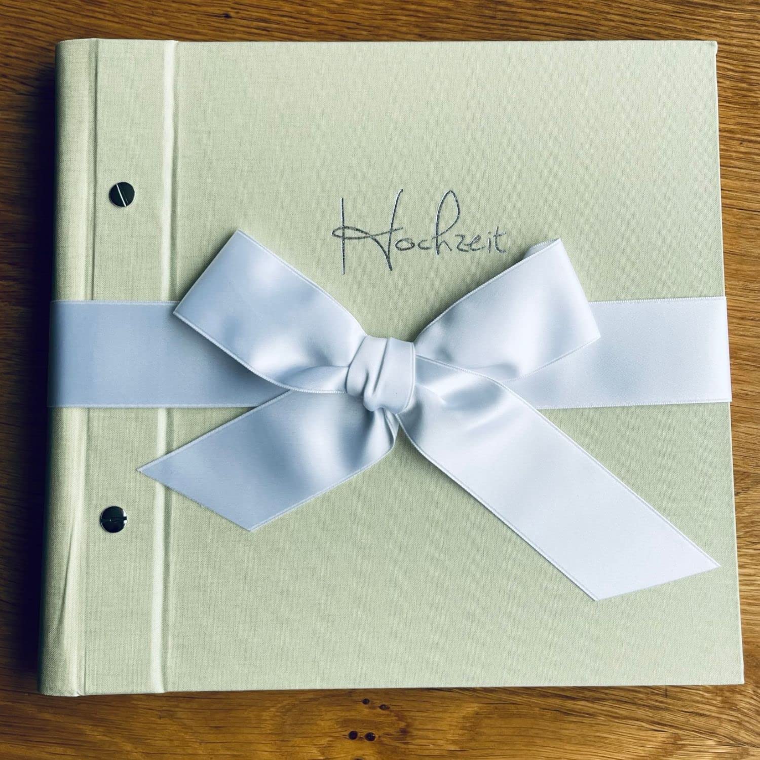 Weddix Hochzeitsalbum Neapel, Mint, erweiterbar - Elegantes Hochzeitsalbum 26 cm, Leinen-Einband in zartem Mint mit weißer Schleife und Prägung Hochzeit in Silber, handgefertigt in Deutschland