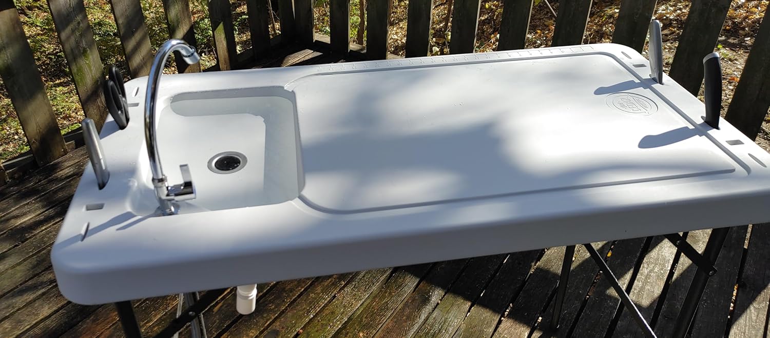 White Polyethylene Fish Cleaning Table with Sink and Steel Legs