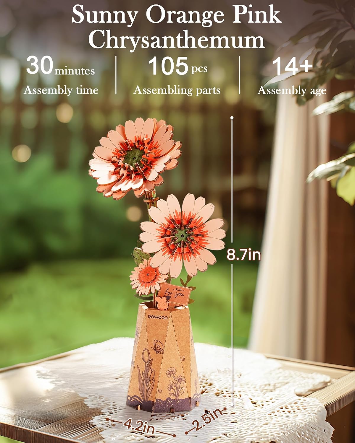 An assembled Orange Gerbera Daisy in its pot, with dimensions indicating its height of 8.7 inches and base width of 4.2 inches.