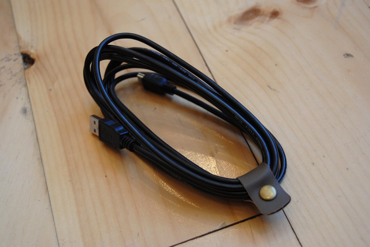 Leather Cable Management for iPhone Mobile Lightning Charger, Earbuds, Headphones Cord Organizer for Work and Travel