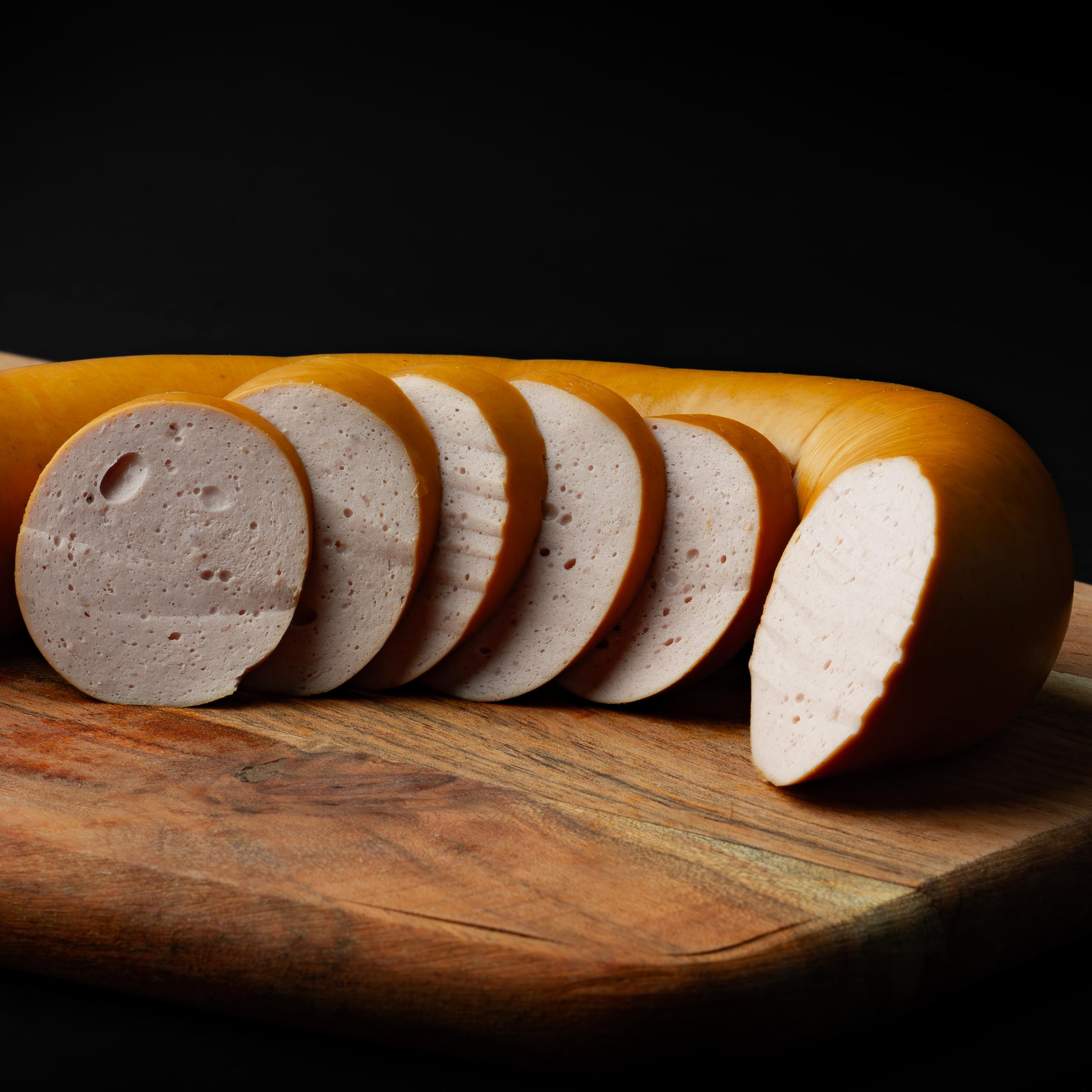 Food-United Lyoner Fleischwurst am Stück 3000g 6 Stück im Ring geräuchert essbare Haut saftig mild würzig ausgesuchte Grundmaterialien von Rind und Schwein Spitzenqualität aus Bayern
