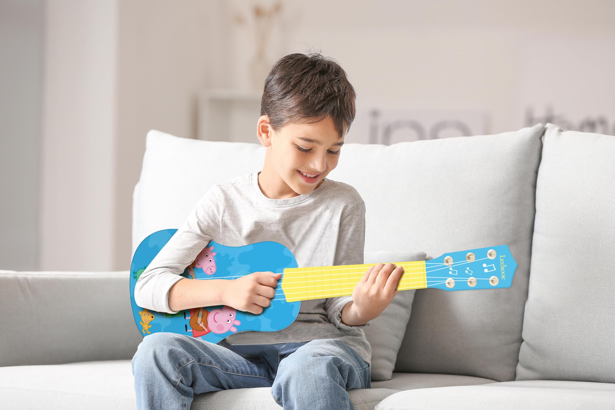 Lexibook, Peppa Pig, My First Guitar per bambini, 6 corde in nylon, lunghezza 53,3 cm, guida inclusa, blu/giallo, K200PPLXB
