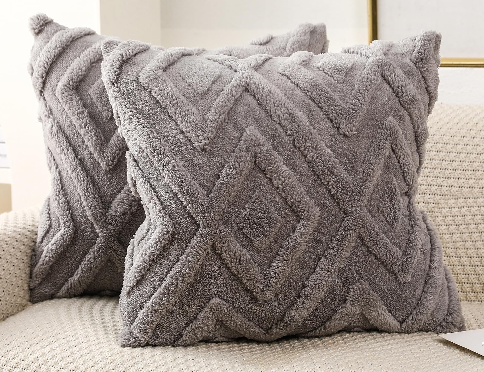 Housse de coussin fausse fourrure gris 66x66 cm bohème à carreaux