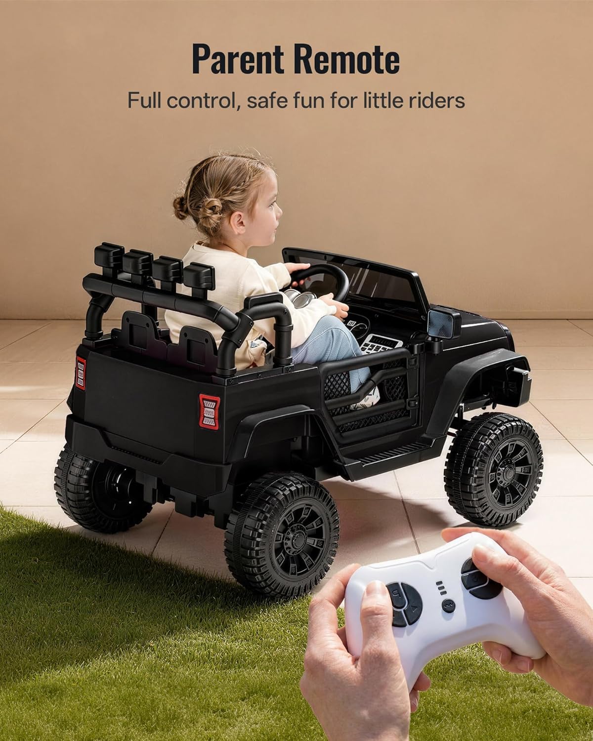 Child in the ride-on car with a parent operating the remote control.